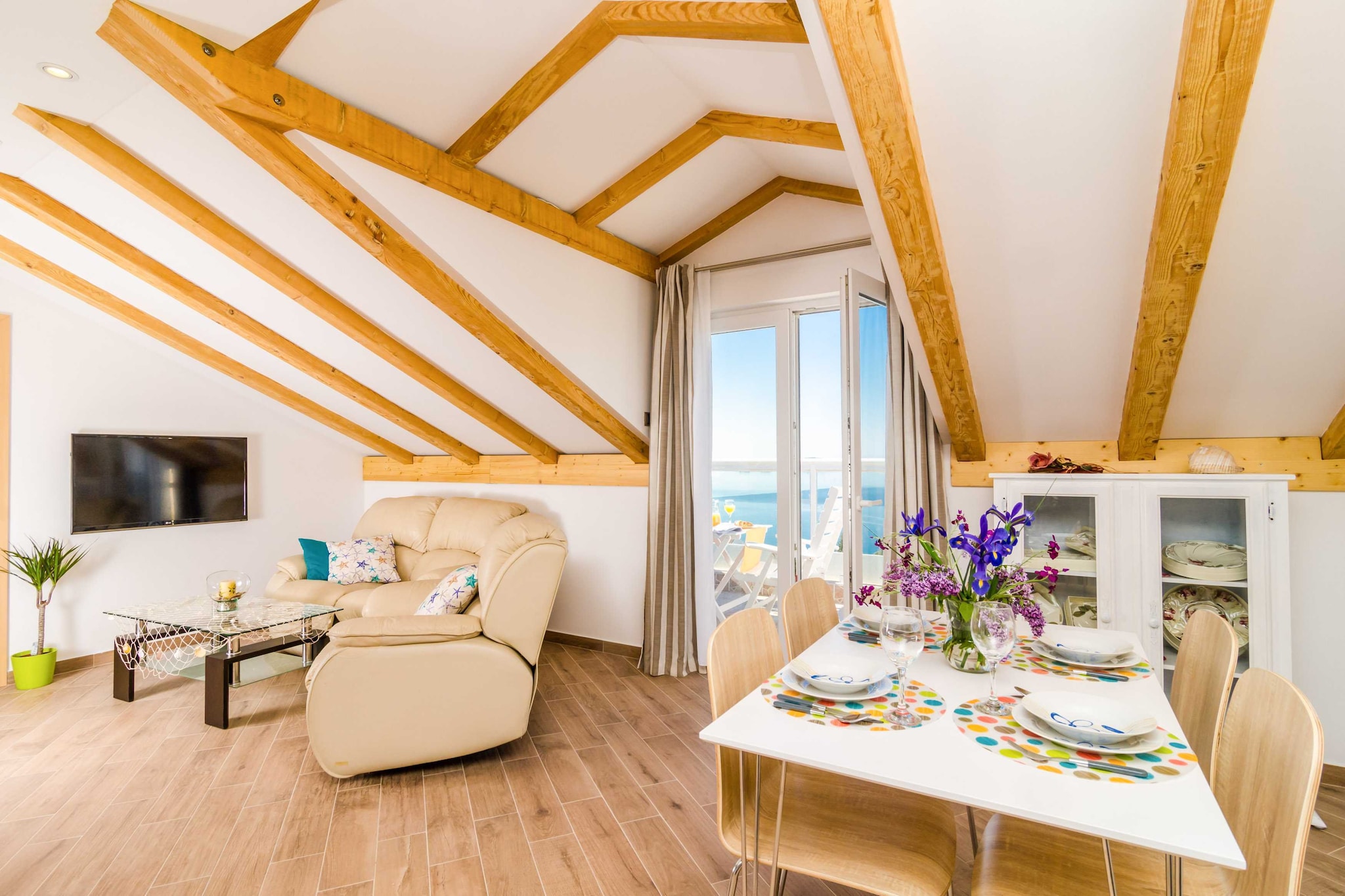 Apartments Knego are situated in Mlini, a lovely village near historic Dubrovnik. Mlini is a small, idyllic fishing settlement located halfway between Dubrovnik and Cavtat with intact beauty, rich vegetation and stunning beaches as well as historical and cultural heritage. Property offers three air-conditioned accommodation units, each with a balcony and breathtaking view of the Adriatic sea.



Parking is free and available on site.

This two bedroom apartment with balcony and sea view features WiFi, Smart TV and air-conditioning. Kitchen is fully equipped with an oven, stove, refrigerator, water kettle, toaster, microwave and dining table. Bathroom includes shower cabin, hair dryer and washing machine. Iron and ironing board are at guest's disposal.
Balcony with an outdoor seating area and barbecue overlooks the Adriatic sea.
Property  offers plenty of sporting activities such as pool table, darts, trampoline for kids and orbitrek. 
Garaged parking is free and available on site.

The closest beach is only 10 min away on foot.  Also, down at the beachfront there are many bars and restaurants. Shopping center with worldwide brands and a big supermarket is 900 m away. Supermarket is 700 m away while the nearest restaurant is only 400 m away.

Nearest bus stop is just  down the street. Distance to Dubrovnik airport in Ä†ilipi is 10 km.