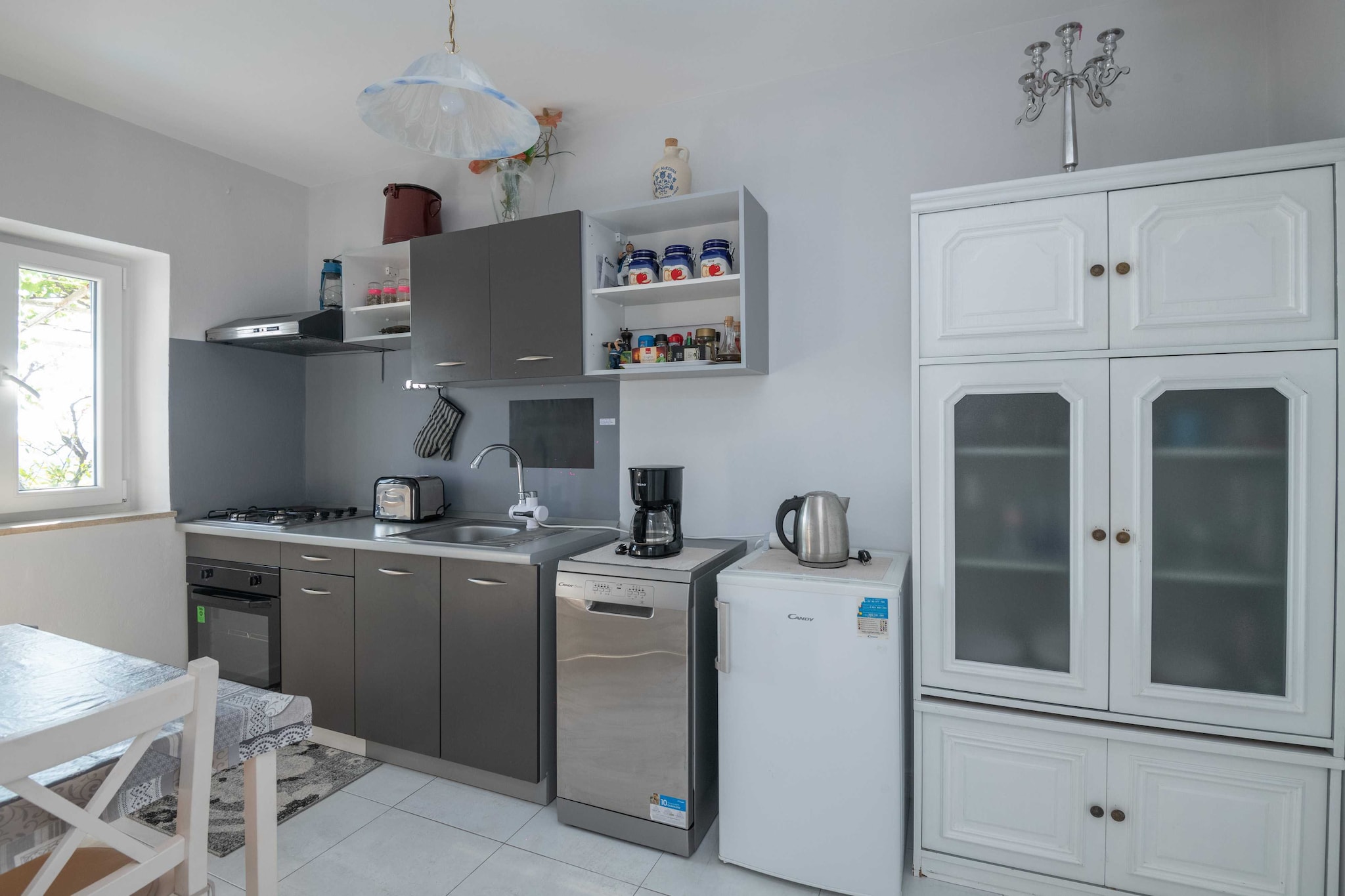 Apartment A Kind of Magic is located in Gornji Kono, 1.5 km away from the famous Old Town of Dubrovnik. 

This air-conditioned apartment features  lovely private furnished terrace with a breathtaking sea view.

Free private parking is possible but reservation is required.

Early check in and luggage storage are not possible.

We have a dog named Essa, she is very kind and will worm welcome you.

This one bedroom apartment features free WiFi, air-conditioning and SAT LCD TV, equipped kitchen with oven, stove, refrigerator, water kettle and dining area, living room and a private bathroom with shower. It will also provide you with a lovely private terrace with a breathtaking sea view.

Washing machine and hairdryer are also at guests disposal. 

Ironing facilities and baby cot are available upon request.

Apartment A Kind of Magic is located in Gornji Kono, a 10 minute ride away from Dubrovnik Old Town. Gornji Kono is one of the longest streets in town. From there, almost wherever you turn, the Old Town is in front of you. This location guarantees peace and tranquility.

The most interesting sights can be seen in the famous Old Town of Dubrovnik, which is 10 minutes from the apartment, as well as various beaches, restaurants, cafes, bars, shops, bakeries and banks. Guests can also find a grocery store 450 meters and a bus station in 100 meters range.

Cable car station is only a  20 minute walk from the apartment. It offers a panoramic view of the historic center and the surrounding islands.

Dubrovnik Bus Station and Ferry Port, connecting the mainland with various Dalmatian islands, are at a distance of 2 km from the apartment, while Dubrovnik Airport is 20 km away.