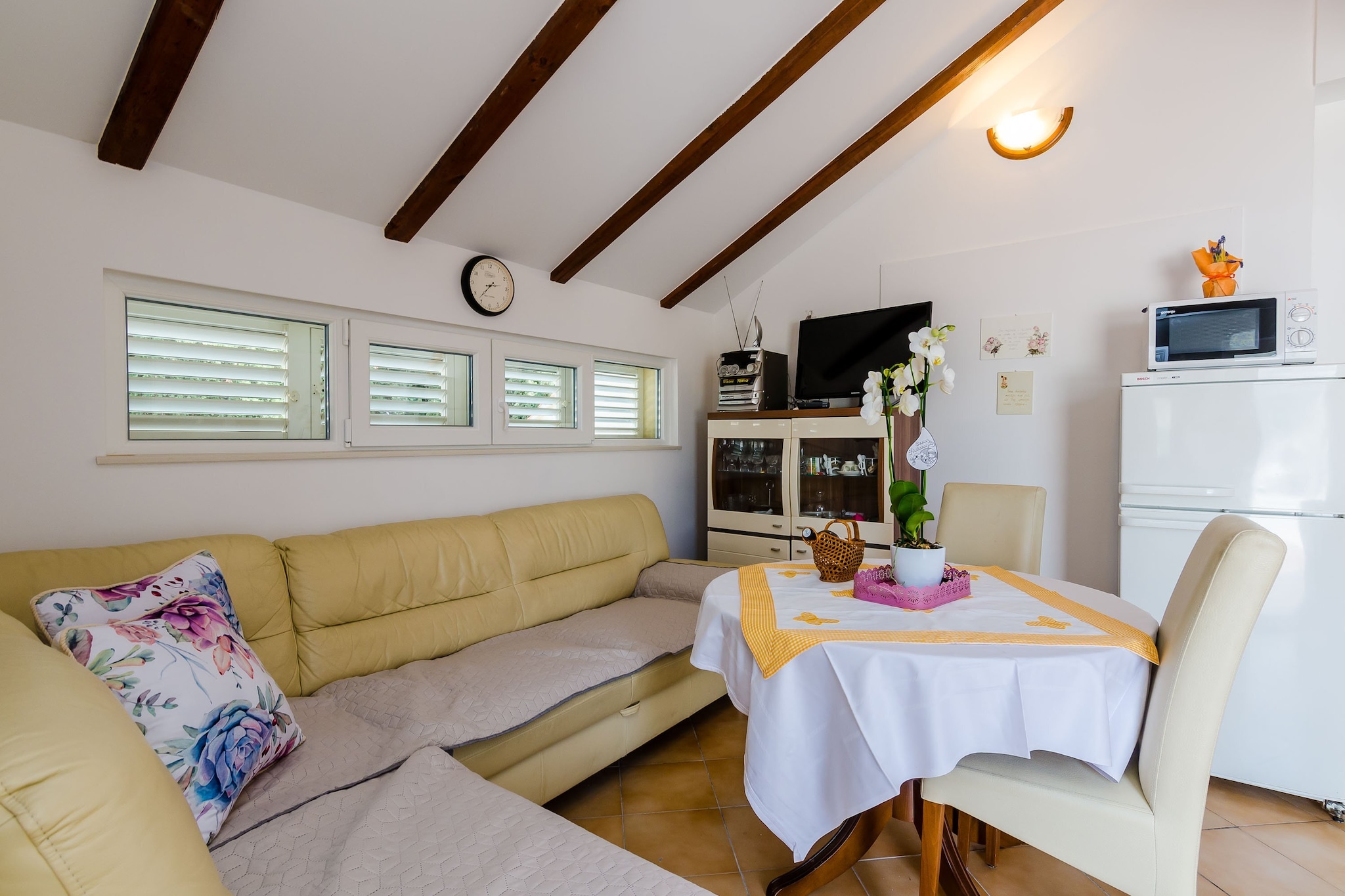 Situated on Lapad Peninsula, only couple of minutes from the nearest beach and with many more in the surrounding area, and 15 minutes ride to the Old Town apartment will offer you everything you need for perfect and relaxing vacation.
Luggage storage before check in is available since the owner lives in the house.
Kindly note
Public parking is available nearby, reservation is not possible and charges are applicable.
Situated on the third floor apartment will provide you with a furnished terrace overlooking the sea. It can accommodate up to two people.
Apartment features free WiFi, air-conditioning and plasma SAT TV, fully equipped kitchen with dining area and a private bathroom.
Many shops, restaurants, cafes, parks and a sea side promenade are a 15-minute walk away. Bank and ATMs, grocery store and bakery are in 1 km range. This location offers a lot of opportunities to relax, since guests can reach various lovely places in couple of minutes walk.
Apartment is 3,5 km from Stradun and the Walls of Dubrovnik.
Dubrovnik bus station and ferry port, connecting the mainland with various Dalmatian islands, are 15 minutes ride from the apartment, while Dubrovnik Airport is 25 km away.