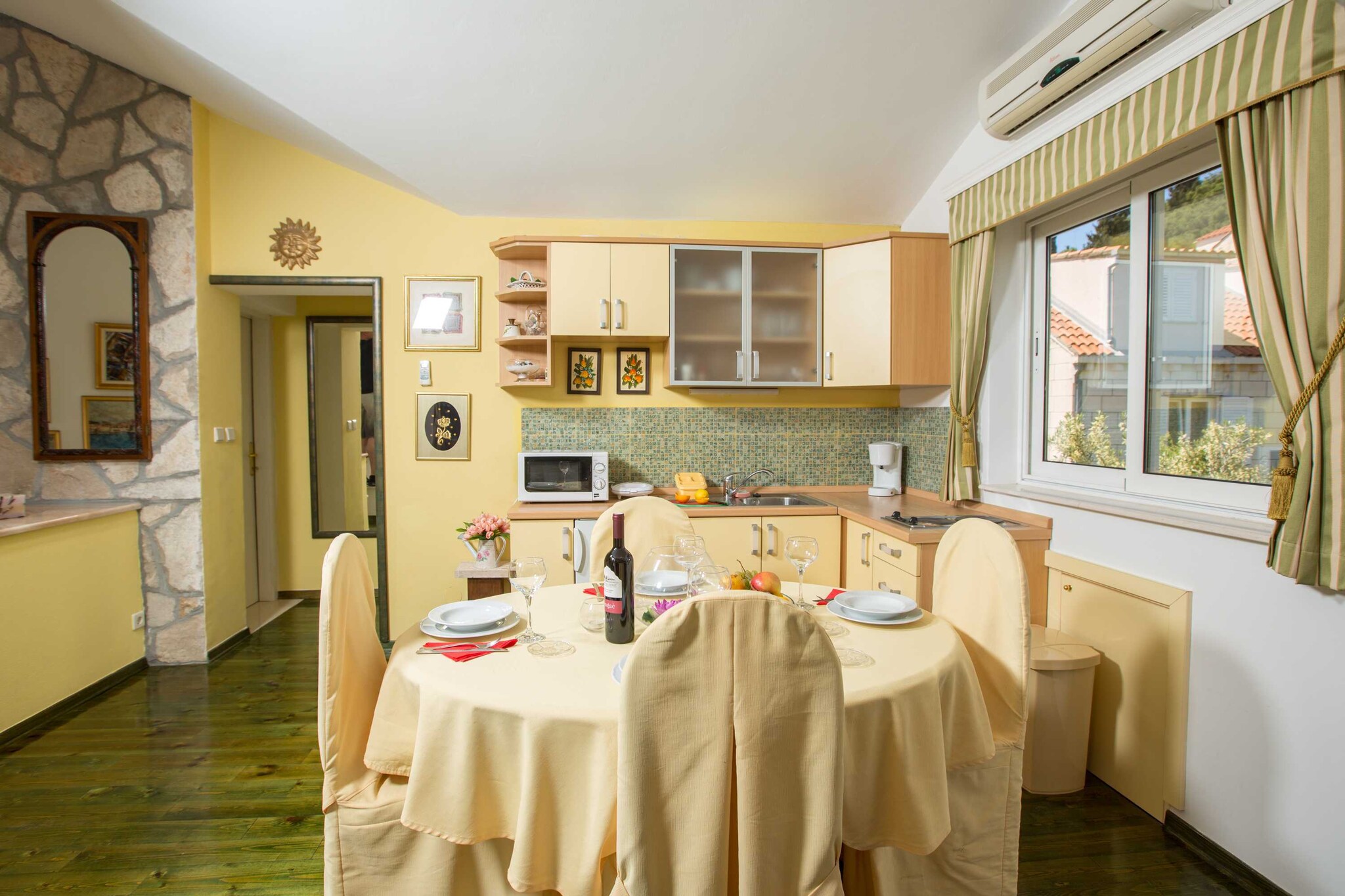 Holiday Home is situated in Lapad, only 10 minutes walk from the beach and 10 minutes ride from the Old Town, with a furnished balcony overlooking the city, perfect for a relaxing family or friends vacation.

Luggage storage before check in is available.

Free parking is available on site (Two parking spots; third on request).

Baby cot is available.

This five-bedroom holiday home can comfortably accommodate up to 10 persons. It features free WiFi, air-conditioning and SAT LCD TV, fully equipped kitchen with dining area, spacious living room and five private bathrooms. 
It will also provide you with a lovely furnished balcony with a city view. 

Baby cot is upon request.

Many shops, restaurants, cafes, parks and a famous promenade are 10 minute walk away, as well as tennis courts, green market and a movie theater. There are also many beaches in the nearby area waiting for your discovery.

Bus stop is 300 meters away from the property.

Dubrovnik bus station and ferry port, connecting the mainland with various Dalmatian islands, are 10 minutes ride from the apartment, while Dubrovnik Airport is 20 km away.