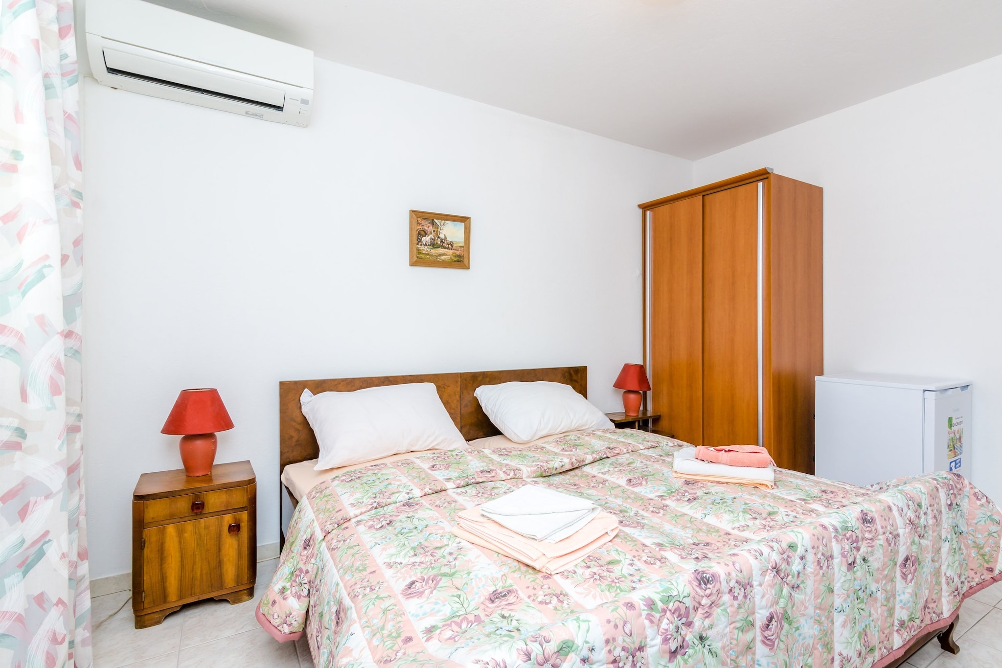 On the 1st floor: (Kitchen(fridge), bedroom(small double bed), bathroom(shower))\n\ntoilet, air conditioning, parking