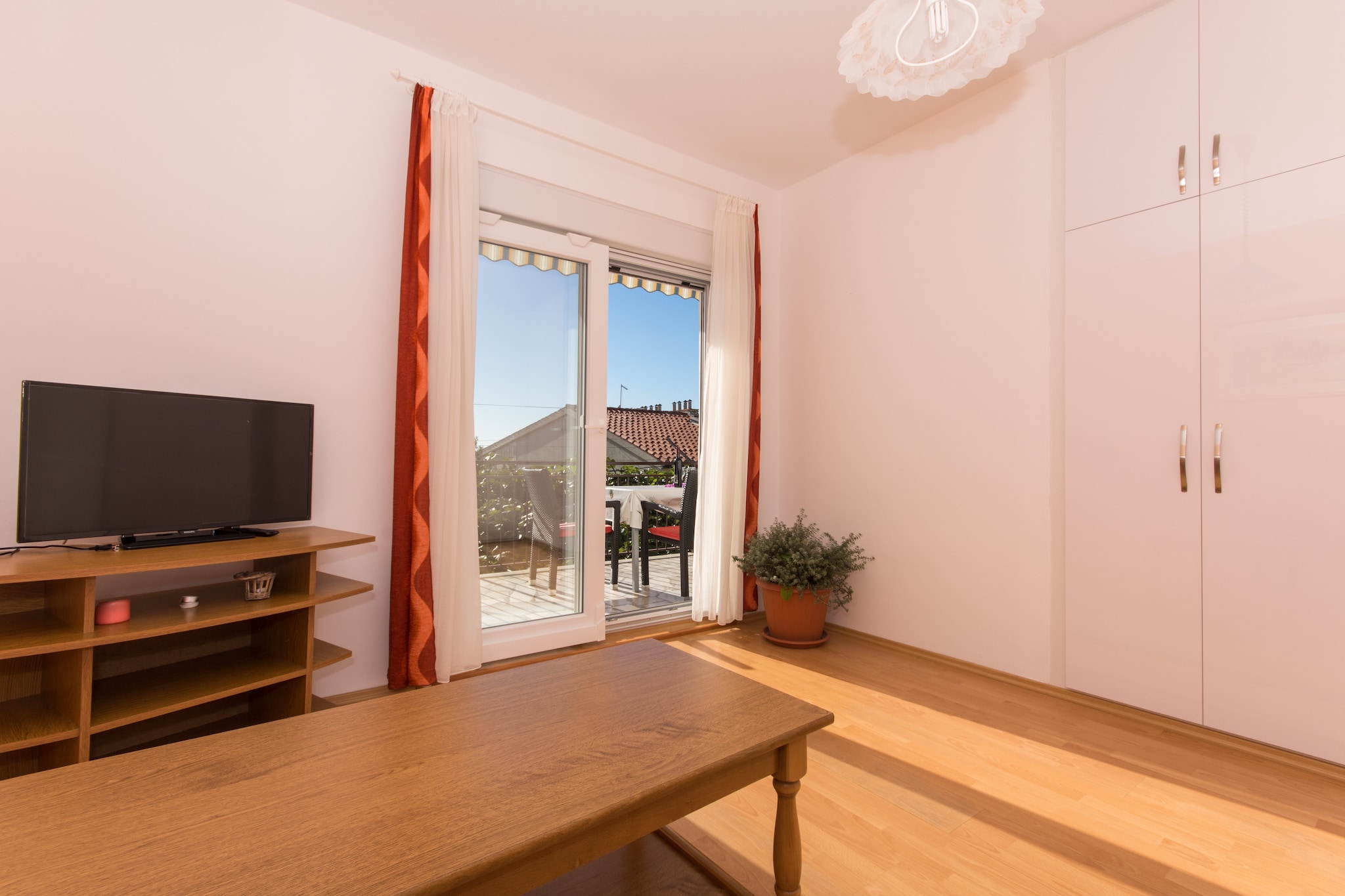 Apartments MasteliÄ‡ are situated in a lovely historical city of Trogir in Split Region.
Shared outdoor heated swimming pool surrounded by sunbeds, as well as BBQ facilities are at your disposal.
The swimming pool is open form 01.05.-01.11.
Check in is possible until 23:30 H (11:30 PM).
Common washing machine is provided.
Luggage storage is possible prior to check in and after check out.
Private parking is available on site, reservation is not required.

Overlooking the Adriatic sea this lovely three bedroom apartment with furnished terrace can comfortably accommodate up to six persons.
Free Wi-Fi and air conditioning are provided. It features spacious living room and  kitchenette with dining area.  Apartment features two private bathrooms with shower, hair dryer, baby cot and free toiletries.

The nearest beach is just 45 meters away from the property, while the market and a bus stop are 150 meters away. The closest restaurant can be found within 300 meters, while the tourist info, post office, bank, ambulance and pharmacy can be found within 1.3 km range.

The nearest airport is Split Airport, located 7  km away from the property.