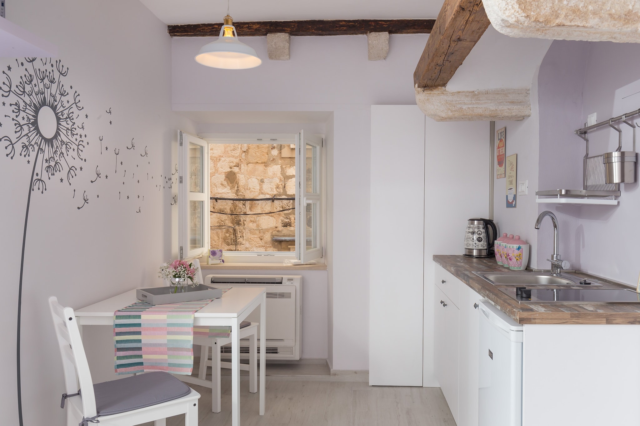 Studio apartment Lumia is situated in the heart of The Old Town, surrounded by City Walls, cobblestone streets and the Stradun promenade making it an ideal place for discovering Dubrovnik. Guest will have unlimited access to WiFi.
This lovely studio apartment features free WiFi, air conditioning, dining area and well equipped kitchenette. Private bathroom comes with shower.
The studio apartment is located 750 meters from the Banje beach with many more of them in surrounding area, and beautiful island Lokrum just a 15 minutes boat ride away. There is an open-air green market and other shops within walking distance, as well as a bakery, banks and ATM's, cafes, bars and restaurants with local and other cuisine. Famous night club Revelin, located inside the old fort, is just 400 meters away. Taxi and bus station are 5 minute walk from the property.
Dubrovnik Bus Station and Ferry Port, connecting the mainland with various Dalmatian islands, are 15 minutes ride from the apartment, while Dubrovnik Airport is 21 km away.