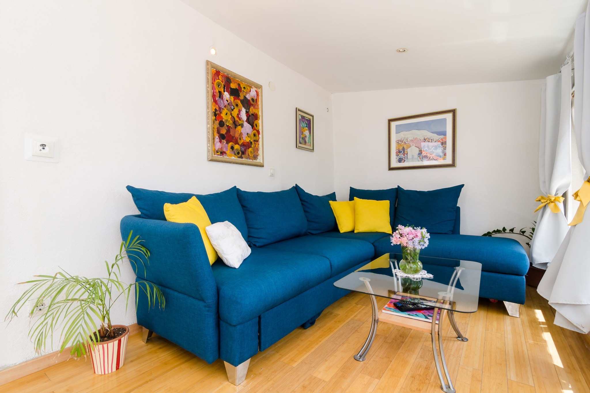 Apartment Emma is located in Lapad, in the heart of modern Dubrovnik. It is ideally placed as it is only a 20 min walk away from both the historic Old City and downtown Dubrovnik.
Luggage storage is available before check in and after check out.
Private parking is provided, reservation is required.
This beautiful two bedroom apartment is perfect fit for up to 5 people.
It features 2 bedrooms - one bedroom with 2 single beds and one bedroom with large double bed. Living area features sofa - convertible single and cable TV. Air conditioning and free WiFi are provided. Kitchen is fully equipped with stove, oven, refrigerator, kettle, microwave, dishwasher, toaster and utensils. Private bathroom features washing machine, bathtub and hair dryer.
Lovely furnished balcony provides sea view.
Apartment Emma is situated in Lapad neighborhood only 2 km away from the historic Old Town and a short walk away from the best beaches Dubrovnik has to offer. The nearest beach is 10 minutes walk from the property. Bus station with a direct line to the Old City of Dubrovnik is 150 meters away.
Grocery store, bus station, restaurants, bars and cafes can be found in 300 meters range, as well as bakeries and ATM's.
Lapad Promenade is 1.5 km away from the accommodation, the same distance as shopping center DOC. The nearest market is 250 m from the property, while the nearest pharmacy is 350 m away from the property.
Dubrovnik airport is 21 km away from the property. Dubrovnik ferry port is located 3 km away, while main bus station is located 2,5 km away.