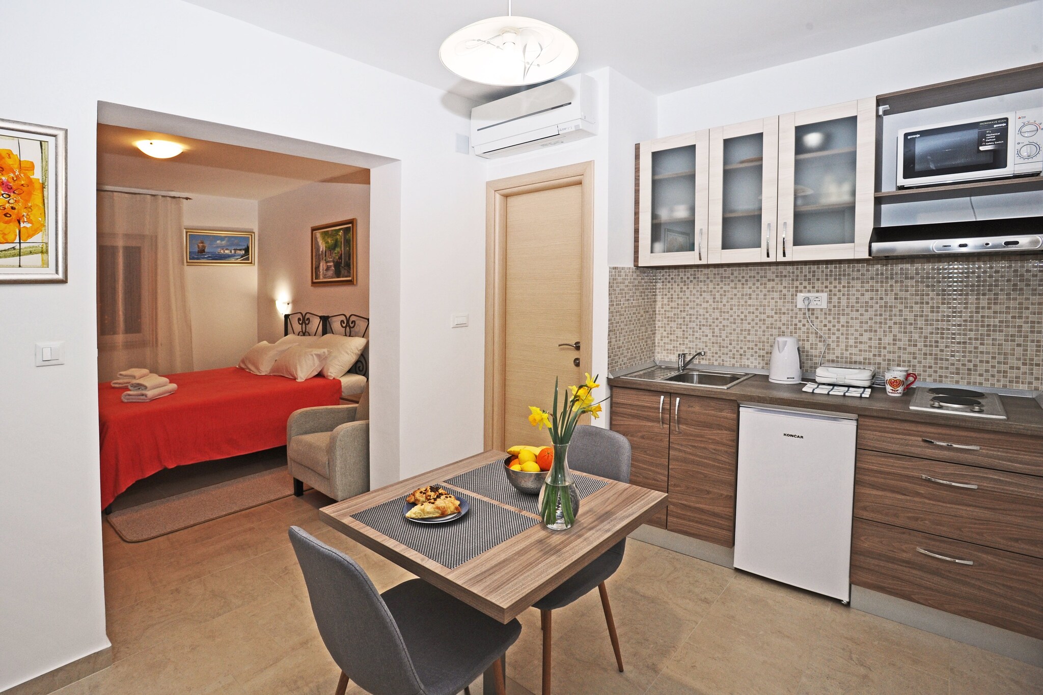 Nika Family Apartments are situated in a quiet neighborhood near Dubrovnik's Main Bus Station and Ferry Port, connecting the mainland with various Dalmatian islands. Apartment's location is perfect for getting  to know undiscovered areas of Dubrovnik. All units have a private bathroom, kitchenette and air conditioning.

*** FACILITY ACCESS ***
The Address "Od Gaja 70, 20000 Dubrovnik" is recommended for arrivals by taxi, transfer or if they come by car to take out the luggage.

This Standard Studio Apartment with Side Terrace and Partial Sea View feature free WiFi, air conditioning, and flat screen TV. Kitchenette is equipped with refrigerator, water kettle, microwave, freezer, stove, and a toaster. Bathroom is fitted with a shower and a hairdryer. Ironing facilities are at guests disposal. 

*** FACILITY ACCESS ***
The Address "Od Gaja 70, 20000 Dubrovnik" is recommended for arrivals by taxi, transfer or if they come by car to take out the luggage.

Grocery store, green market, restaurants, cafes, bakeries and ATMs can be reached by foot in 12 minutes. The famous Old Town of Dubrovnik is approximately 2.8 km away, with various beaches, historic sights, restaurants, cafes, bars and shops. The nearest bus station, with frequent bus lines, is 350 meters from the apartment.

Dubrovnik Bus Station and Ferry Port, connecting the mainland with various Dalmatian islands, are 14 minutes from the apartment, while Dubrovnik Airport is 21.7 km away.