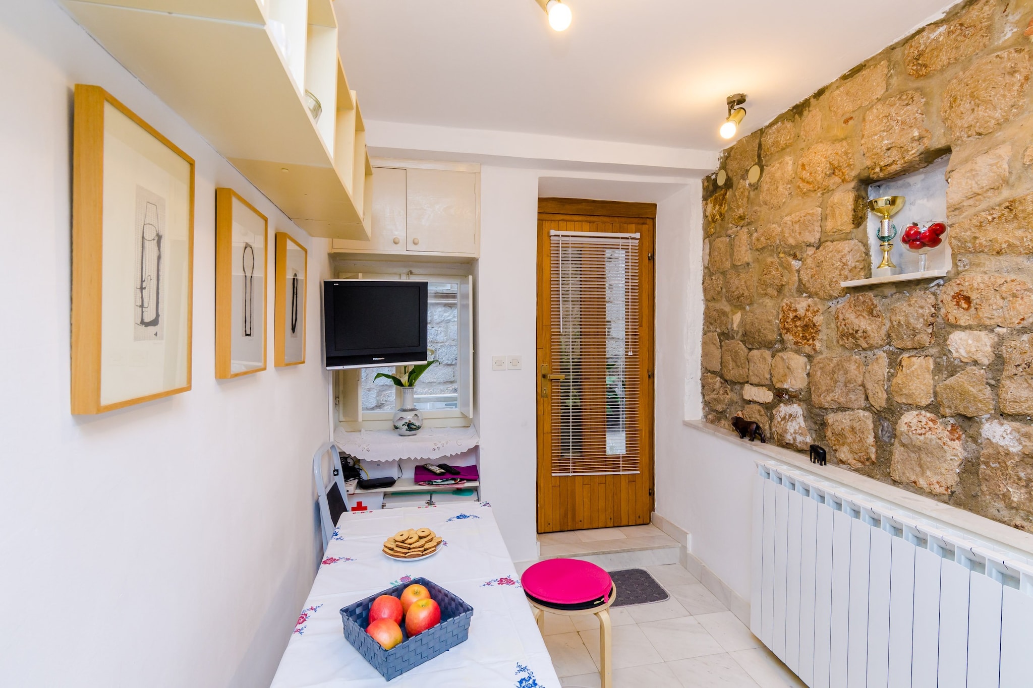Art House Zanze features two bedroom apartment located just few steps from Stradun, Dubrovnik main street. Located inside the Old town, Art House Zanze offer easy access to numerous sights to visit.
WiFi is provided in the property.
Check in office and key pick up point is at the address Getaldiceva ulica 9, 20000 Dubrovnik (a short walking distance from the property).
This lovely Two Bedroom apartment features WiFi, air conditioning, and cable TV. Kitchen is equipped with oven, refrigerator, water kettle, stove, and toaster. Two bedrooms feature single beds, while the bathroom is equipped with shower, hair dryer, and free toiletries.
Washing machine and ironing facilities are at the guest disposal.
The Old Town’s central street Stradun is less than 1 minute walk away. Grocery store, bus station Pile, restaurants, bars and cafes can be found within walking distance, as well as bakeries and ATM's. The famous Banje beach is 500 m away. We recommend enjoying a cable car ride, station is within walking distance from the apartment. It offers a panoramic view of the historic center and the surrounding islands.
Dubrovnik Main Bus Station and Ferry Port, connecting the mainland with various Dalmatian islands, are 15 minutes by bus from bus station Pile, while Dubrovnik Airport is 21 km away.