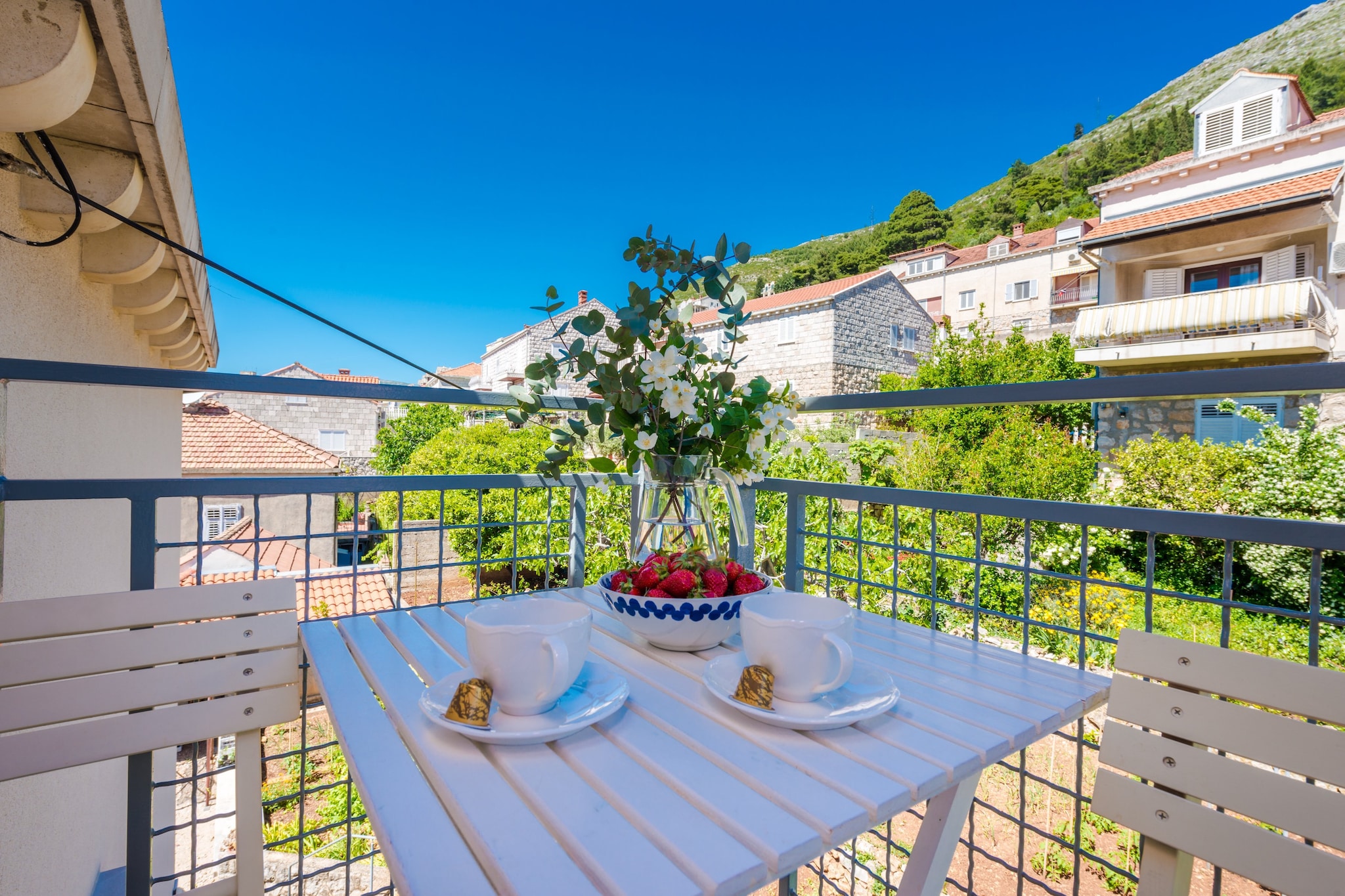 Apartments Terra are located in Gruž, lovely neighborhood which is the best choice if you want to spend your vacations in peace and quiet environment, far from the city crowds, and also to have nearby all you need during your holidays. 

Property offers two accommodation units, both feature balcony with city or garden view, fully equipped open space kitchen with dining area, living room with siting area and bathroom. 
Washing machine and ironing facilities are provided.

Luggage storage is available prior check in and after check out. 

Baby cot is available on request.

This one bedroom apartment features bedroom with two single beds and cable TV. Sofa - convertible single is provided. Kitchen is well equipped with oven, stove, refrigerator, water kettle, microwave, toaster, coffee maker and dining area with dining table. Apartment features private bathroom with shower, hair dryer, toilet paper. Air conditioning and cleaning necessities are provided. Apartment features balcony with lovely garden view. 

This one bedroom apartment can comfortably accommodate up to 3 persons.

The property is located approximately 1.5 kilometers from Dubrovnik Main Bus Station and Ferry Port. Grocery store, green market, restaurants, cafes, bakeries and ATMs can be reached by foot in 5 minutes. It is 2 km from Lapad Bay with its beautiful beaches.



The famous Old Town of Dubrovnik is 1.9 km away, with various beaches, historic sights, restaurants, cafes, bars and shops. The nearest bus station is 30 meters from the apartment, with buses passing frequently and less that 5 minute ride to the Old Town, or 25 minute walk.

Dubrovnik Bus Station and Ferry Port, connecting the mainland with various Dalmatian islands, are 15 minutes from the apartment by foot, while Dubrovnik Airport is 21 km away.