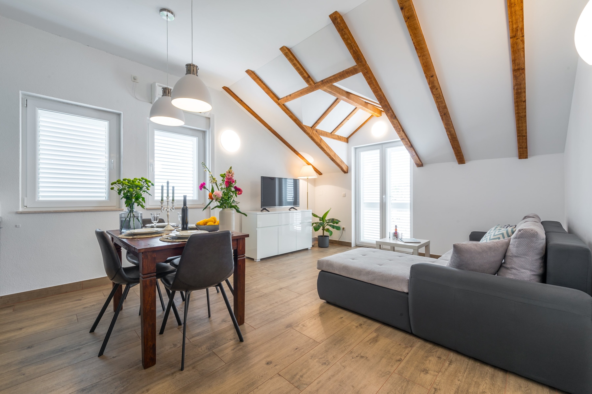 Apartments Terra are located in Gruž, lovely neighborhood which is the best choice if you want to spend your vacations in peace and quiet environment, far from the city crowds, and also to have nearby all you need during your holidays.
Property offers two accommodation units, both feature balcony with city or garden view, fully equipped open space kitchen with dining area, living room with siting area and bathroom.
Washing machine and ironing facilities are provided.
Luggage storage is available prior check in and after check out.
Baby cot is available on request.
This comfort one bedroom apartment features bedroom with large double bed. Living area features sofa - convertible double. Kitchen is well equipped with oven, stove, refrigerator, water kettle, microwave, toaster, coffee maker and dining area with dining table. Apartment features private bathroom with shower, hair dryer, toilet paper. Air conditioning and cleaning necessities are provided. Apartment features balcony with city view.
This one bedroom apartment can comfortably accommodate up to 4 persons.
The property is located approximately 1.5 kilometers from Dubrovnik Main Bus Station and Ferry Port. Grocery store, green market, restaurants, cafes, bakeries and ATMs can be reached by foot in 5 minutes. It is 2 km from Lapad Bay with its beautiful beaches.
The famous Old Town of Dubrovnik is 1.9 km away, with various beaches, historic sights, restaurants, cafes, bars and shops. The nearest bus station is 30 meters from the apartment, with buses passing frequently and less that 5 minute ride to the Old Town, or 25 minute walk.
Dubrovnik Bus Station and Ferry Port, connecting the mainland with various Dalmatian islands, are 15 minutes from the apartment by foot, while Dubrovnik Airport is 21 km away.