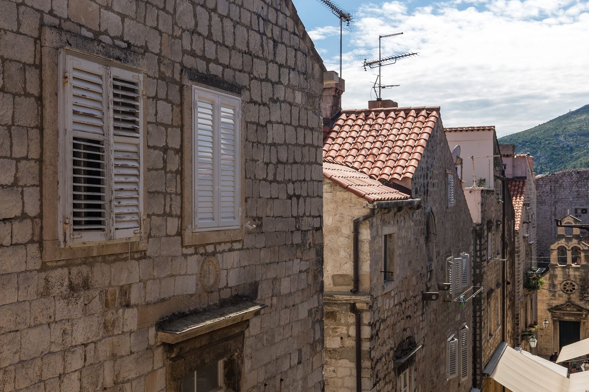 Apartments Urbis offers three self- catering accommodation situated in the heart of The Old Town, surrounded by City Walls, cobblestone streets and the Stradun promenade making it an ideal place for discovering Dubrovnik.
Each unit has a dining area,  kitchenette and private bathroom. Guest will have unlimited access to WiFi.

Premium studio apartment with city view features free wifi, air condition, flat screen TV and SAT TV, so as kitchenette equipped with oven, refrigerator, water kettle, microwave, and dining area, as well as sitting area with sofa. Apartment also consists of bathroom with shower and hairdryer.

The Old Townâ€™s central street Stradun is just 2 minutes walk away. The apartment is located only 600 meters from the nearest beach, Banje beach, with many more of them in surrounding area and beautiful island Lokrum just a 15 minutes boat ride away. There is an open-air green market and other shops within 190 meters walking distance, as well as a bakery, banks and ATMs, cafes, bars and restaurants with local and other cuisine. Famous night club Revelin, located inside the old fort, is just 280 meters away. 
There is no need for public transit while you're staying here, but if you want to see other parts of the town, for example peaceful Lapad Bay, you can be there in a 10 minute drive. Taxi and bus station are 6 minute walking from the property.

Dubrovnik Bus Station and Ferry Port, connecting the mainland with various Dalmatian islands, are 12 minutes ride from the apartment, while Dubrovnik Airport is 20,8 km away.