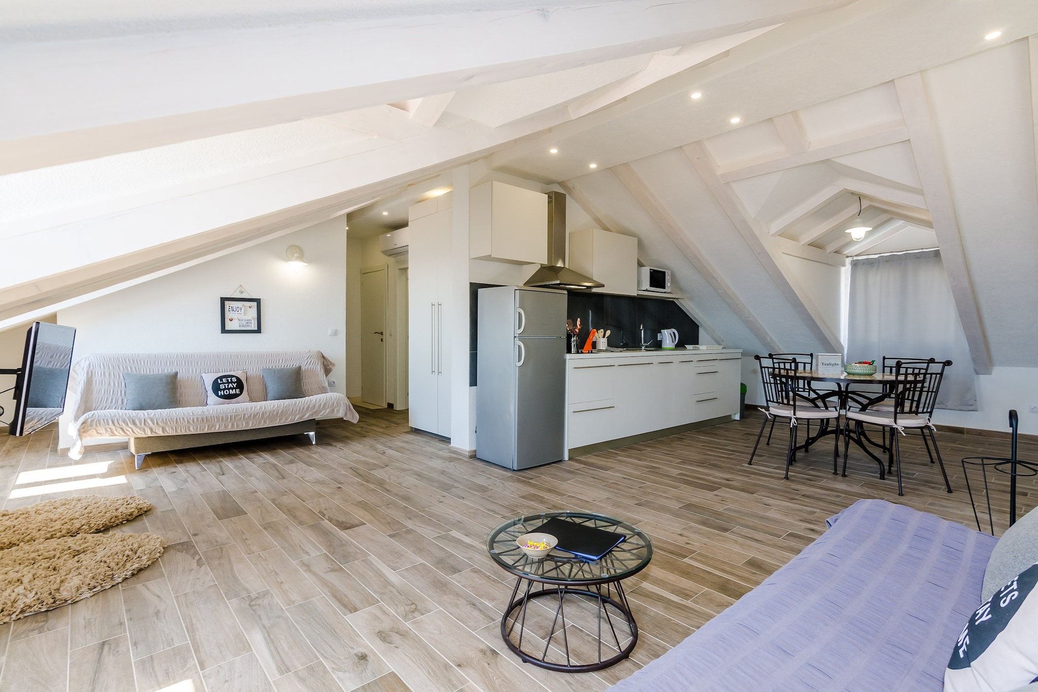 Apartments Life are located in Nuncijata neighborhood in Dubrovnik. Perfect place for guests who love to enjoy the sun and the sea, being close to the touristic center, but far enough to avoid the crowds and keep their peace and privacy. The property is located 3.1 km away the famous Old Town of Dubrovnik with various beaches, historic sights, restaurants, cafes, bars and shops.
Kindly note:
Private parking is available on site, reservation is not needed. Private parking is 1per 1reservation. so parking can only get 1car and not several cars.
This two apartment features free wifi, air conditioning, flat screen SAT TV .
Apartment is located on two floors. First floor contains living room with sofa, bathroom, specious bedroom and kitchenette with dining area. In the attic you will find bedroom, bathroom, living room with two extendable couches as well as kitchen with dining area.
Guests can enjoy their staying on balcony with outdoor furniture. Private parking is provided.
Grocery store, green market, restaurants, cafes, bakeries and ATMs can all be reached by foot in 20 minutes walk. The property is located 3 km from Lapad Bay with its beautiful beaches.
The nearest bus station is just down the street, 270 meters from the apartment, with buses passing frequently and less than 10 minutes ride to the Old Town. Dubrovnik Bus Station and Ferry Port, connecting the mainland with various Dalmatian islands, are 11 minutes ride from the apartment, while Dubrovnik Airport is 21.7 km away.