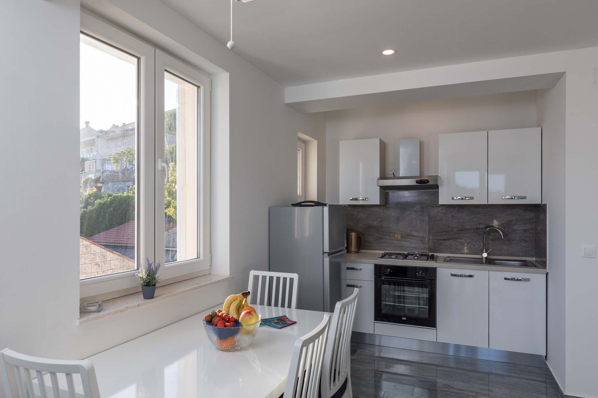 BegoviÄ‡ Guest House is situated on Babin Kuk Peninsula, only couple of minutes from the nearest beach and with many more in the surrounding area.

Luggage storage is possible prior check in and after check out, so you can explore the city a little more before your departure.



Free private parking is available, reservation is required.

This lovely one bedroom apartment with furnished balcony is perfectly fit for up to four people. It features free WiFi, air conditioning, TV, as well as open space living room, kitchen and dining table. The apartment has private bathroom with shower, hairdryer and toilet.

Washing machine is at your disposal.

Iron and baby cot are available upon request.

This location offers a lot of opportunities to relax, since guests can reach various lovely places in couple of minutes walk. Many shops, restaurants, cafes, parks, beaches and a beautiful sea side promenade are a 2-minute walk away. Bank and ATM's, grocery store and bakery can be reached in 500 meters range.
Dubrovnikâ€™s Old Town is just a 15-minute bus ride away, with a bus stop 350 meters from the property.

Dubrovnik bus station and ferry port, connecting the mainland with various Dalmatian islands, are 8 minutes ride from the accommodation, while Dubrovnik Airport is 22.7 km away.