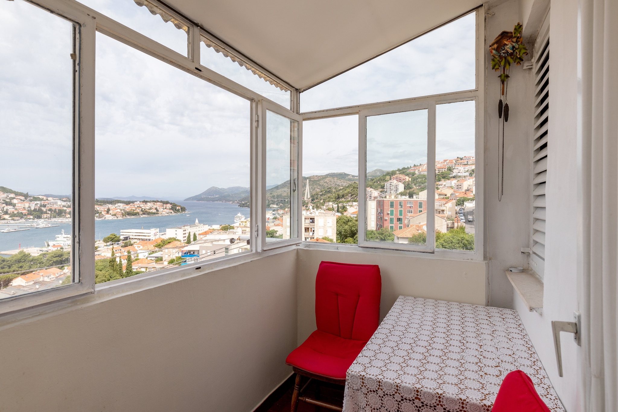 Apartment Puerto is located in Gruž neighborhood grown around the large bay that spreads on the west side of the town. In the way it is the main entrance to Dubrovnik – all ferries, cruise ships and buses arrive in Gruž as the main port/harbour, ferry terminal, cruise port and bus station are all located there.
Luggage storage before check in and after check out area available, so that you can explore the area a a bit more before departure.

Free public (street) parking is available, reservation is not possible. 
Please note the street were the property is located is very narrow and crowded, it will be difficult to find a parking place.

Overlooking the Adriatic sea this studio apartment with furnished balcony is perfectly fit for up to two people.
It features free WiFi, air conditioning and TV, as well as equipped kitchen with dining table and private bathroom with bathtub and hair dryer. Please note: External bathroom is situated in the hallway, the kitchen is next door. Keep in mind that the owner is using the room next to the entrance and you don't have access to it. Although the owner is living next door you will have full privacy.
Washing machine and ironing facilities are at your disposal.

The property is located approximately 900 meters from Dubrovnik main bus Station and ferry port. Grocery store, green market, restaurants, cafes, bakeries and ATM's can be reached by foot in 10 minutes. 
The famous Old Town of Dubrovnik is 2.8 km away, with various beaches, historic sights, restaurants, cafes, bars and shops. The nearest bus station is  approx. 120 meters from the apartment, with buses passing frequently and less that 15 minute ride to the Old Town, or 30 minute walk.

Dubrovnik Airport is approximately 21 km away.