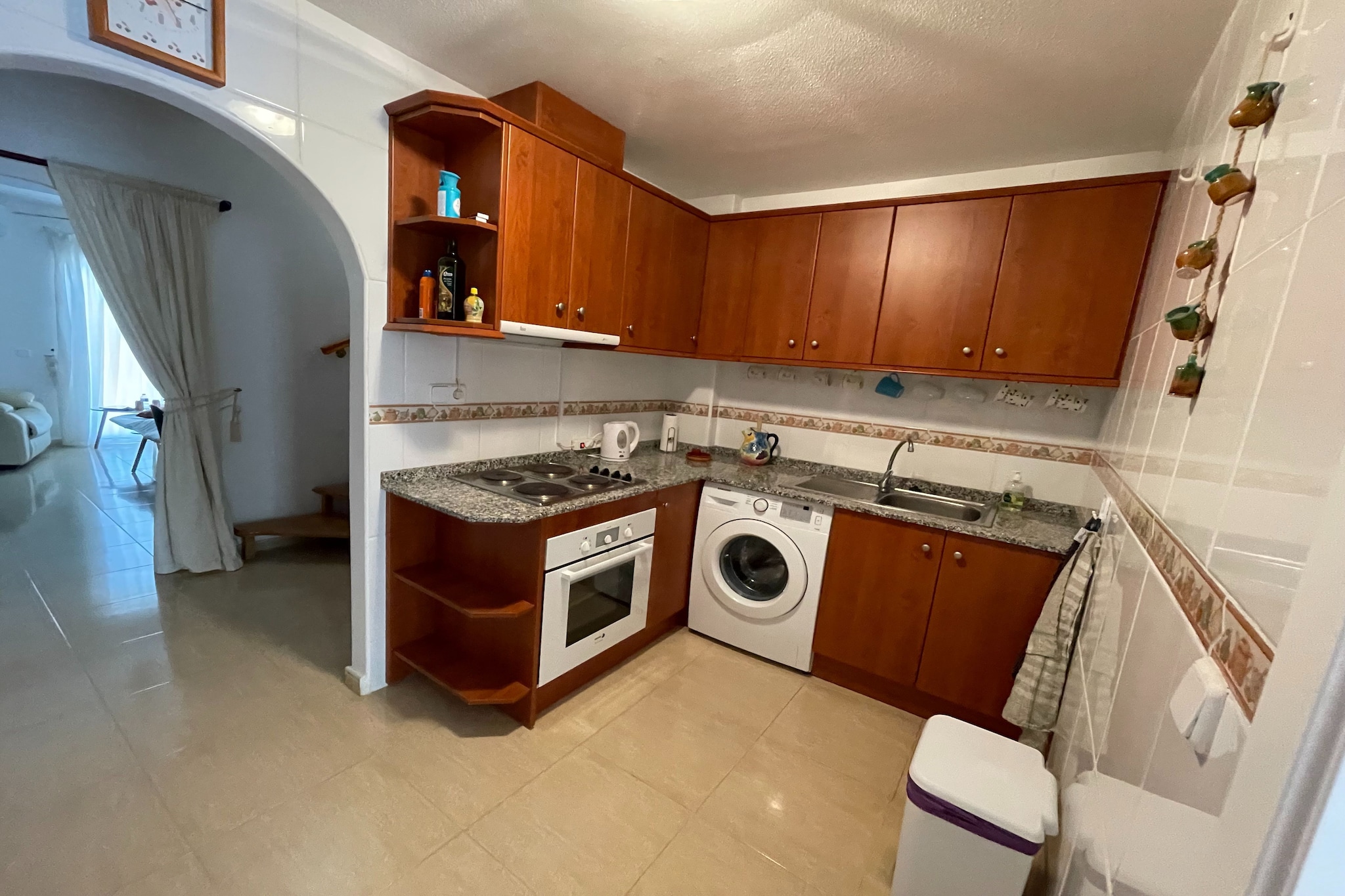 On the 1st floor: (Entrance(acces via outside stairway), Kitchen(electric kettle, coffee machine, oven, microwave, fridge-freezer, washing machine, ironing board, iron), Living/diningroom(TV(smart TV), dining table, seating area, DVD player, wireless music system, air conditioning), bedroom(double bed(160 x 200 cm), air conditioning), bathroom(bathtub with shower, washbasin, toilet))\n\nOn the 2nd floor: (bedroom(2x single bed(90 x 200 cm), air conditioning), bathroom(shower, washbasin, toilet), 2x terrace(private, fenced), parasol)\n\nheating, air conditioning, parking, swimming pool(shared with other guests, outside), boules court, children\'s bed, high chair, stair gate