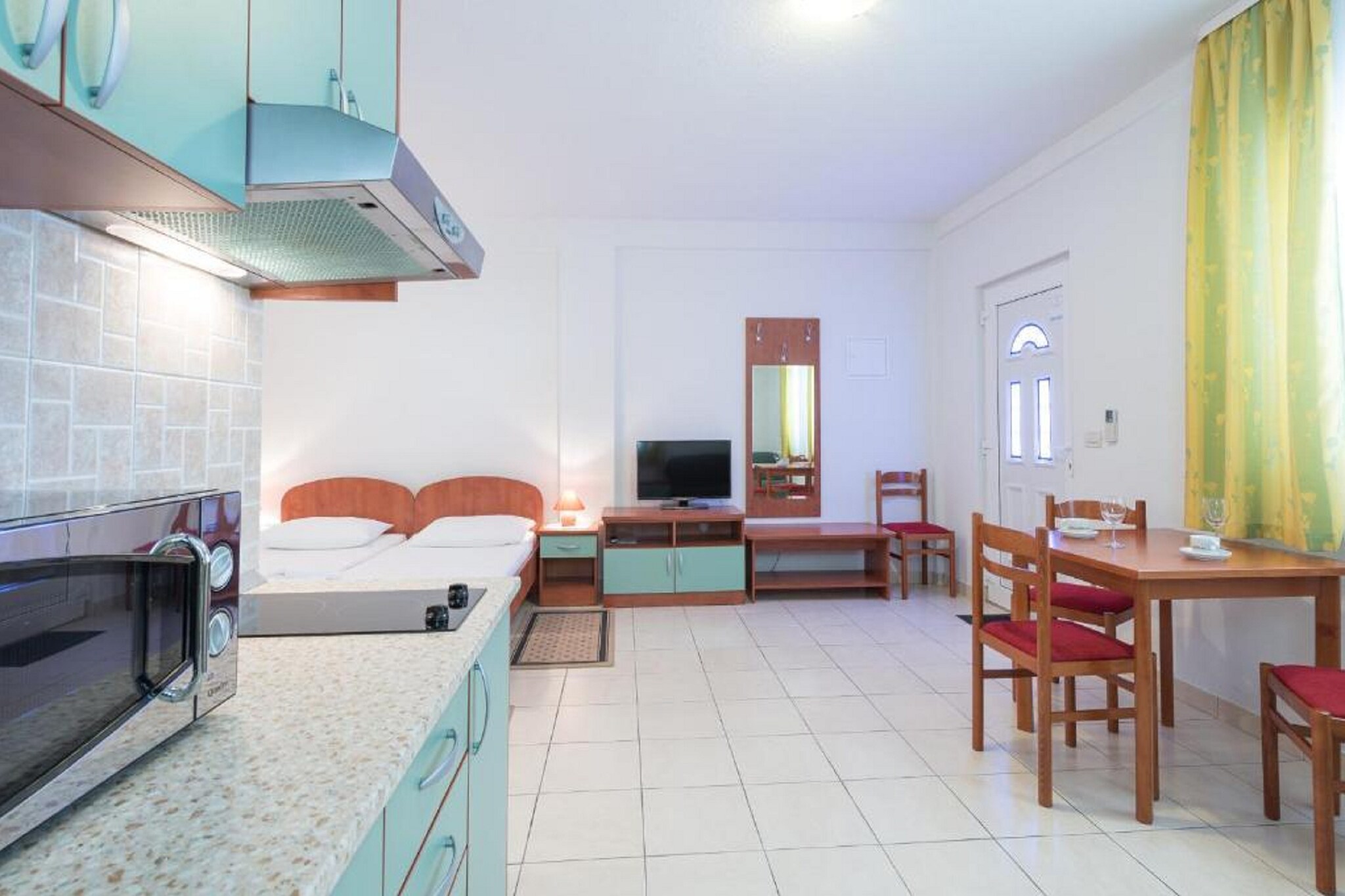 Villa Borna Apartments are situated in Babin Kuk neighborhood in Dubrovnik, 10 min drive away from the historic Old City and a short walk away from the best beaches Dubrovnik has to offer.
Spacious terrace fitted with sun beds and parasols as well as a common seasonal outdoor swimming pool and a shared garden are at your disposal, which makes this place ideal for a nice and relaxing family or friends vacation.
This lovely studio apartment with a shared furnished terrace is perfectly fit for up to two people where the twin beds can be joined together or separated. It features free WiFi, air conditioning as well as SAT LCD TV. The equipped kitchen comes with a dining area, and the private bathroom comes with a shower and toilet.
Free toiletries (shampoo, soap, and toilet paper), hairdryer, as well as linens and towels, are at your disposal.
If you want to spend your vacation in peace and quiet environment, far from the city crowds, and also to have nearby all you need during your holidays Villa Borna Apartments are the best choice for you. In the neighborhood, you will find grocery stores, cafes, restaurants, ATM's as well as children's playgrounds and the famous Lapad Promenade
A bus station with a direct line to the Old City of Dubrovnik is 120 meters away. Main bus station and ferry port are across the bay, 3 km drive away from the property while Dubrovnik Airport is 23 km away from the property.