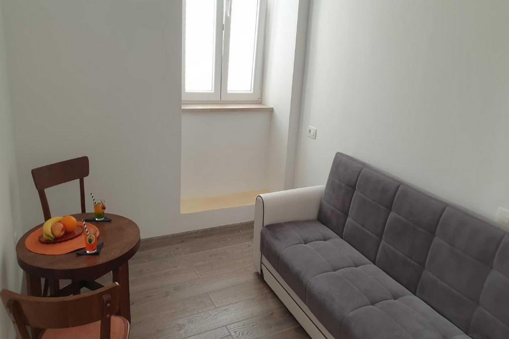 PK apartments are located in the heart of the beautiful Historic Old City of Dubrovnik, surrounded by magnificent walls and historic details. Thanks to the property's good location, everything you may need is within a walking distance. 

PK apartments offer accommodation in two units with a city view and free Wifi. All the units have air-conditioning as well as a flat-screen TV. 
If you are arriving by car, please keep in mind that Dubrovnik Old Town is a pedestrian zone.

This two bedroom apartment with a city view has a private entrance and it is on the second floor. This air conditioned apartment can perfectly fit up to three people. Equipped kitchen comes with  oven, refrigerator, water kettle, trash cans, stove and kitchen utensils.  The private bathroom comes with a shower and toilet. 
Hairdryer, towels as well as bed linen are at your disposal.

If You want to see a lot of famous sights, this is the perfect location for You! The accommodation is situated inside the city walls, so everything You may need is in 300 meters range.   

The Old Townâ€™s central street Stradun is just a minute walk away.
The accommodation is located just 600 meters from the nearest beach Banje, with many more of them in surrounding area and beautiful island Lokrum just a 15 minutes boat ride away. There is an open-air green market and other shops within walking distance, as well as a bakery, banks and ATM's, cafes, bars and restaurants with local and other cuisine. Famous night club Revelin, located inside the old fort, is just 200 meters away.

There is no need for public transit while You're staying here, but if You want to see other parts of the town, for example peaceful Lapad Bay, You can be there in a 10 minute drive. 
Taxi and bus station are 5 minute walk from the property.

Dubrovnik Bus Station and Ferry Port, connecting the mainland with various Dalmatian islands, are 10 minutes ride from the apartment, while Dubrovnik Airport is 20 km away.