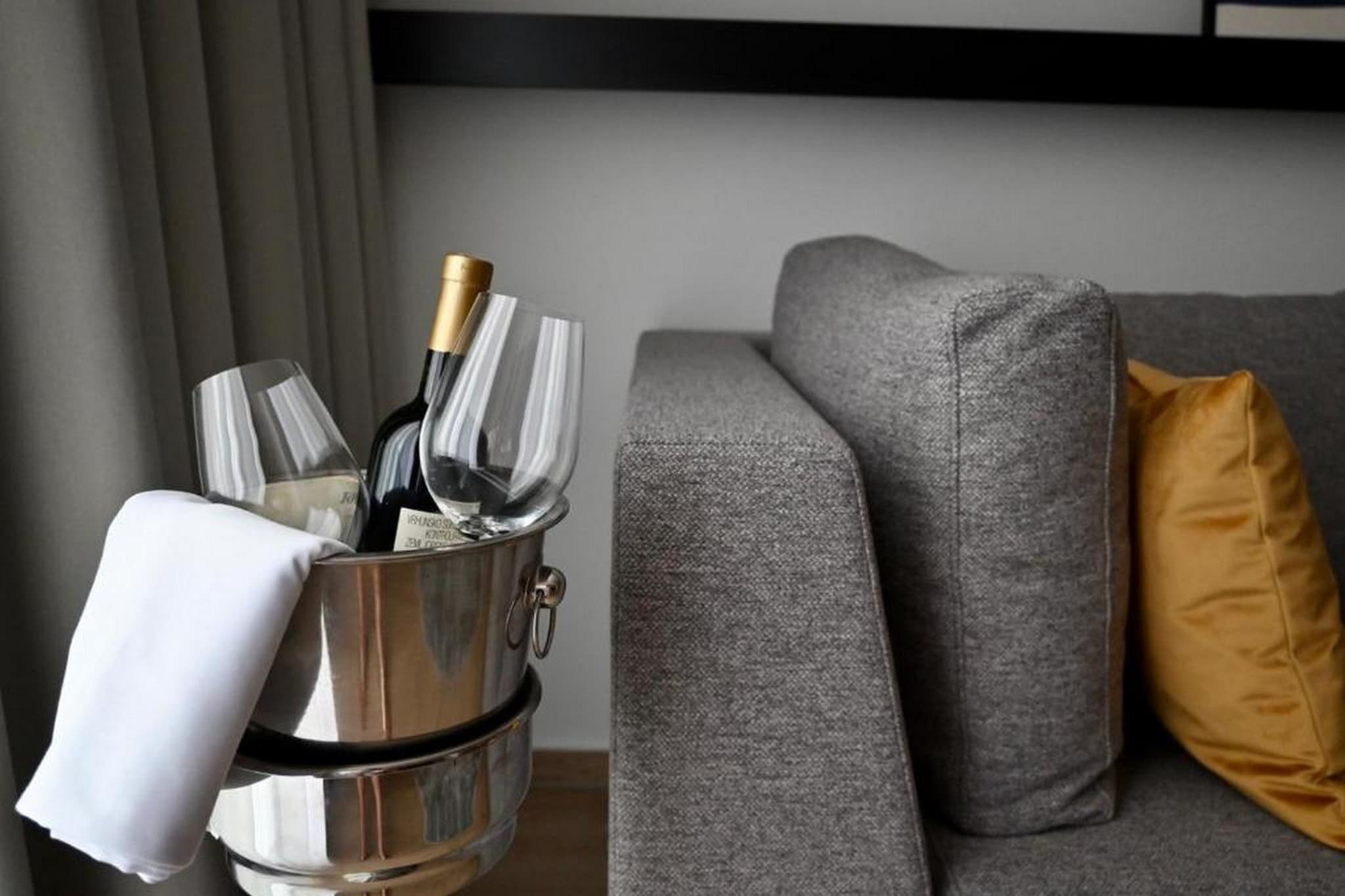 Boutique Apartment Petra is located only 10 min drive away from the historic Old City and a short walk away from the best beaches Dubrovnik has to offer. 

Boutique Apartment Petra comes with a furnished private balcony. 

The apartment features free Wifi throughout the property as well as air-conditioning. 

Private parking is provided and reservation is not required.

This lovely one bedroom apartment with balcony and city view can accommodate up to four people. The open space living room comes with sofa and sitting area, and it's combined with the equipped kitchen and dining area.  Kitchen is well equipped with an oven, refrigerator, water kettle, freezer, , vito ceramics, coffee maker, dishwasher, and kitchen utensils. Bedroom comes with large double bed. The private bathroom comes with shower and toilet. 
Apartment is on the second floor. 
Free toiletries, hair dryer as well as linens and towels are at your disposal.

The location of this apartment is perfect for being close to the touristic centre, but far enough to avoid the crowds and keep their peace and privacy. The nearest beach is located 1 km away. The nearest market can be found at 200 m distance, while caffe bar and restaurant can be found at 50 m distance. Pharmacy can be found at 500 m distance.

Bus station is located only 10 m away from the property. Dubrovnik Airport is located 30 km away.