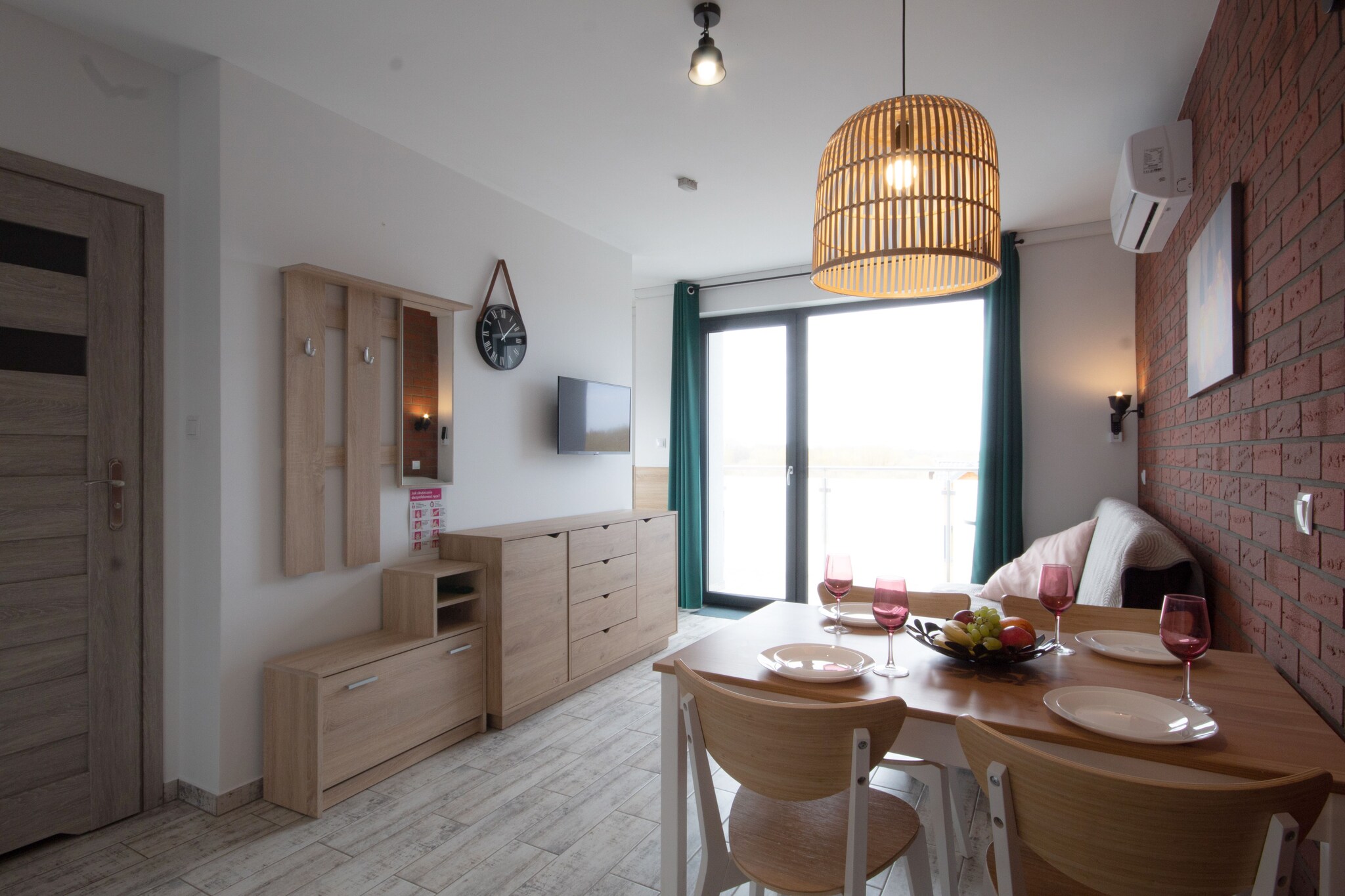 Apartment building in a quiet area, 200 m from the beach, a few steps from the center of the resort. There is full infrastructure on site ensuring an attractive and relaxing holiday stay.
Cozy apartment with a balcony. It is a large room that serves as both a living room and a bedroom. There is a table, TV, 2 single beds and a fold-out double sofa bed. The kitchen is connected to the room. Bathroom with shower. The apartment has air conditioning with cooling and heating functions.
Wireless Internet is available. Free parking.
On the premises of the resort there is an attractive playground for children, a barbecue gazebo, a table tennis table, table football, an outdoor gym.

Included in the price of the stay: bed linen, internet, parking, final cleaning (for stays of at least 7 days).
SianoÅ¼Ä™ty is a small holiday resort located approx. 10 km from KoÅ‚obrzeg, in the immediate vicinity of another seaside resort - Ustronie Morskie. Golden sand and a gentle descent to the sea encourage holidaymakers to sunbathe and swim in the sea. There is a walking pier in the neighbouring Ustronie Morskie. SianoÅ¼Ä™ty is a rather quiet summer resort, where you can count on real relaxation. The resort borders Ustronie Morskie, which, if necessary, offers many more attractions typical of seaside towns. The international R-10 cycling trail runs through SianoÅ¼Ä™ty. It runs along the coast and provides amazing views of both the beaches, the sea and the charming peat bogs. From here, you can easily and pleasantly get to the nearby Ustronie Morskie, but also to the large KoÅ‚obrzeg.