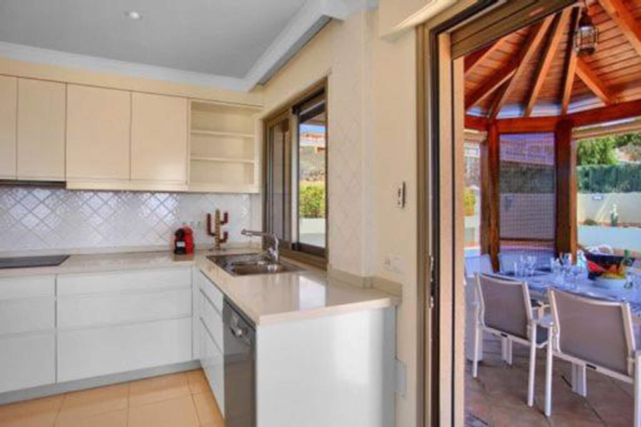 Ground floor: (Kitchen(dining table, stove, electric kettle, toaster, oven, microwave, dishwasher, fridge-freezer, washing machine), Living/diningroom(double sofa bed, TV, dining table, seating area), Bedroom with bathroom(double bed, shower, toilet, bidet, hairdryer), Bedroom with bathroom(double bed, bathtub or shower, toilet, bidet, hairdryer), Bedroom with bathroom(double bed, bathtub or shower, toilet, bidet, hairdryer), Bedroom with bathroom(double bed, bathtub or shower, toilet, bidet, hairdryer))\n\nbalcony, patio, terrace, garden, sun loungers, private outdoor pool