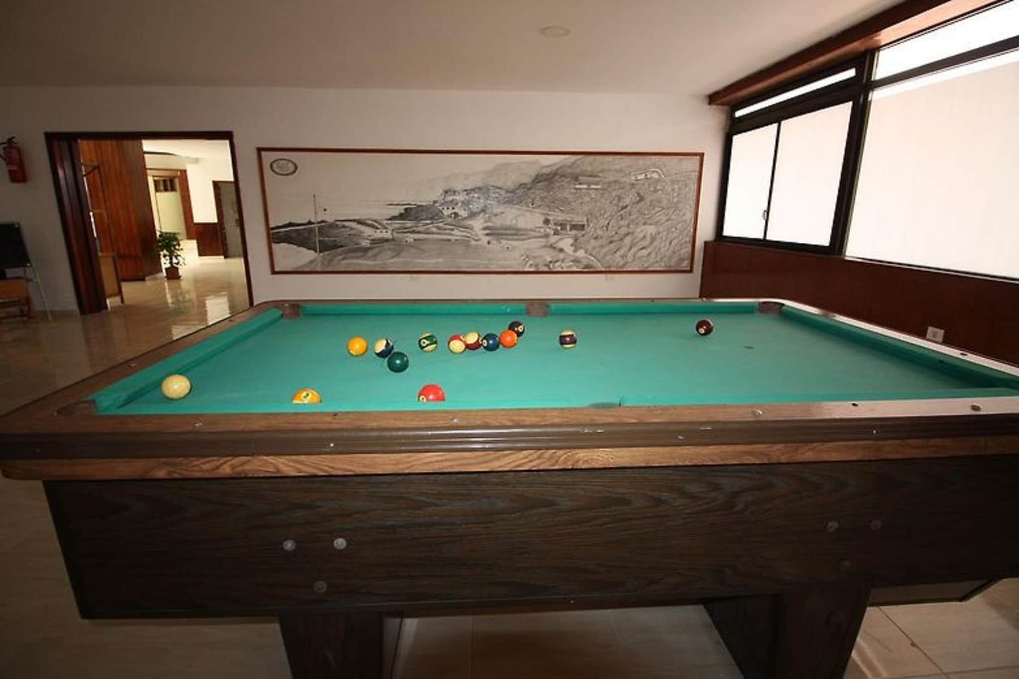 This cozy apartment on the Spanish island of Tenerife has a nice location by the sea and a wonderful swimming pool. It is ideal for romantic sun holidays with the love of your life, both in summer and in winter.
On Tenerife you will find beautiful beaches, cozy restaurants and nice shops. Spend a sunny day at the Playa de la Arena and take a beautiful photo at the Cueva La Vaca. Admire the impressive Volcan El Teide or opt for a day of water fun in Siam Park. On the Mercado Municipal Nuestra Senora de Africa you will find fresh products in an authentic market atmosphere.
The holiday home has a washing machine and you can prepare your favorite dishes in the well -equipped kitchen. The comfortable living room has a sofa bed, a dining table, a TV and a seating area. On the balcony or terrace you can relax the day with a glass of wine.
About Belvilla
When you stay in a Belvilla home, you can rest assured of a unique holiday home in ideal surroundings at an attractive price. The portfolio of accommodations consists of more than 40,000-holiday homes in 20 European countries. Interested in a weekend getaway, a summer or winter sports holiday or simply a short break? Do you prefer the coast, the countryside or the mountains? Whatever your preference, there is a Belvilla home to meet your needs, from a cosy gîte for two to a castle big enough for the entire family, from an apartment in the heart of Rome to a cabin in the middle of nowhere, from a simple tree house to a luxury dream villa and from close to home to the other side of Europe.
A Belvilla home gives you the freedom to enjoy breakfast in your pyjamas or continue a good conversation into the morning hours without having to worry about the bar's closing time. Prepare gourmet meals with fresh local ingredients in your own kitchen and take advantage of having your own swimming pool to do as many cannonballs as you want! In other words, you can enjoy complete privacy in your home away from home.