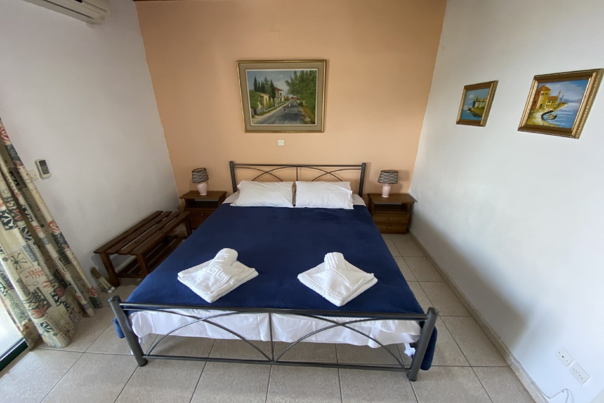 Featuring an outdoor pool and a fitness room, this sea view studio offers accommodation for a small family or a group of 3-friends. You can relax in the garden while kids enjoy at the playground.

This apartment is set in Achílleion, 8 km from Corfu Town. Paleokastritsa is 22 km from the accommodation, while Glyfada is 10 km away. Do visitb Achílleion Palace 800 m away. Taste the mouth-watering delicacies from the restaurants located 800 m away. 

This apartment unit comes with a washing machine so make sure to pack light! A well-equipped kitchen for preparing delicious meals. The parking facility is also available here. In the garden, you can close the day with barbecue meals and drinks. 

The nearest airport is Corfu International Airport, 6 km away. 
