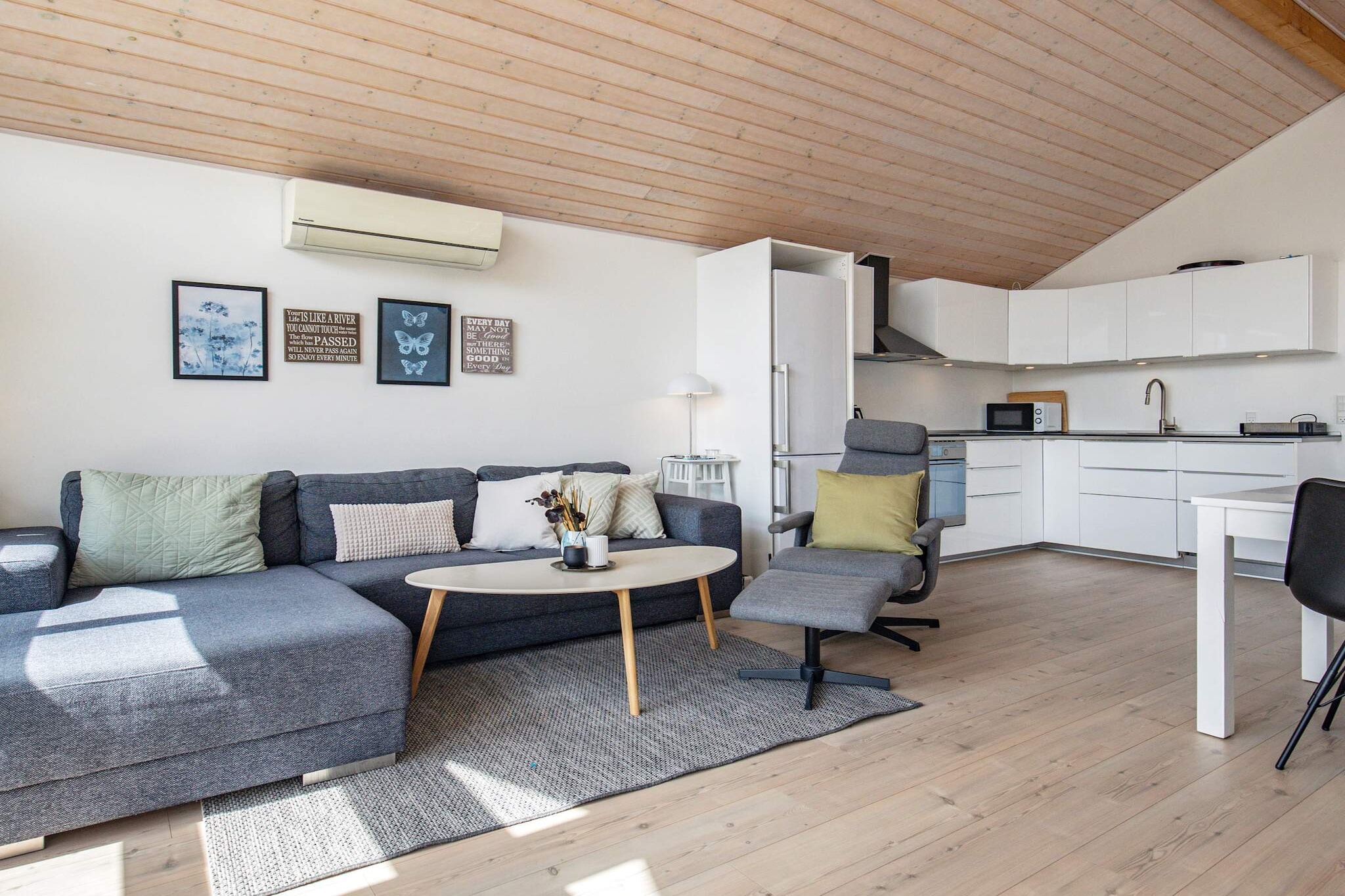 Kitchen(stove(induction), coffee machine, microwave, dishwasher, fridge-freezer), Living/bed room(TV), bedroom(double bed), bedroom(double bed), bathroom(washbasin, shower, toilet), balcony or terrace, heating(electric), garden furniture, sun loungers, air to air heatpump