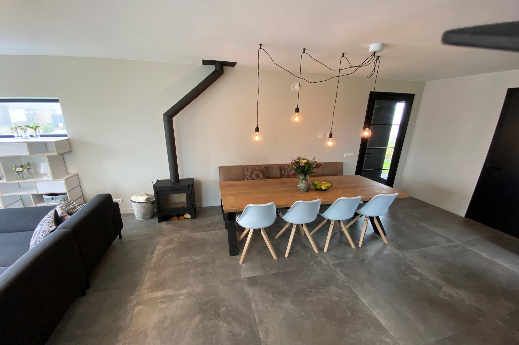 Ground floor: (hallway, open kitchen(dining table, dining table, hob(induction), electric kettle, toaster, coffee machine(cups), oven, dishwasher, fridge-freezer), Living/diningroom(TV(smart TV), seating area), Bedroom with bathroom(double bed(boxspring), shower(walk-in shower), washbasin), toilet(washbasin, toilet))\n\nOn the 1st floor: (bedroom(single bed(80 x 200 cm), single loft bed(80 x 200 cm)), bedroom(double bed(boxspring)), Bedroom with bathroom(double bed(boxspring), shower(walk-in shower), washbasin), bathroom(shower, washbasin), toilet(washbasin, toilet), Landing)\n\njetty, fireplace, tumble dryer, shower(outside), washing machine, heating(floor heating), terrace, garden, garden furniture