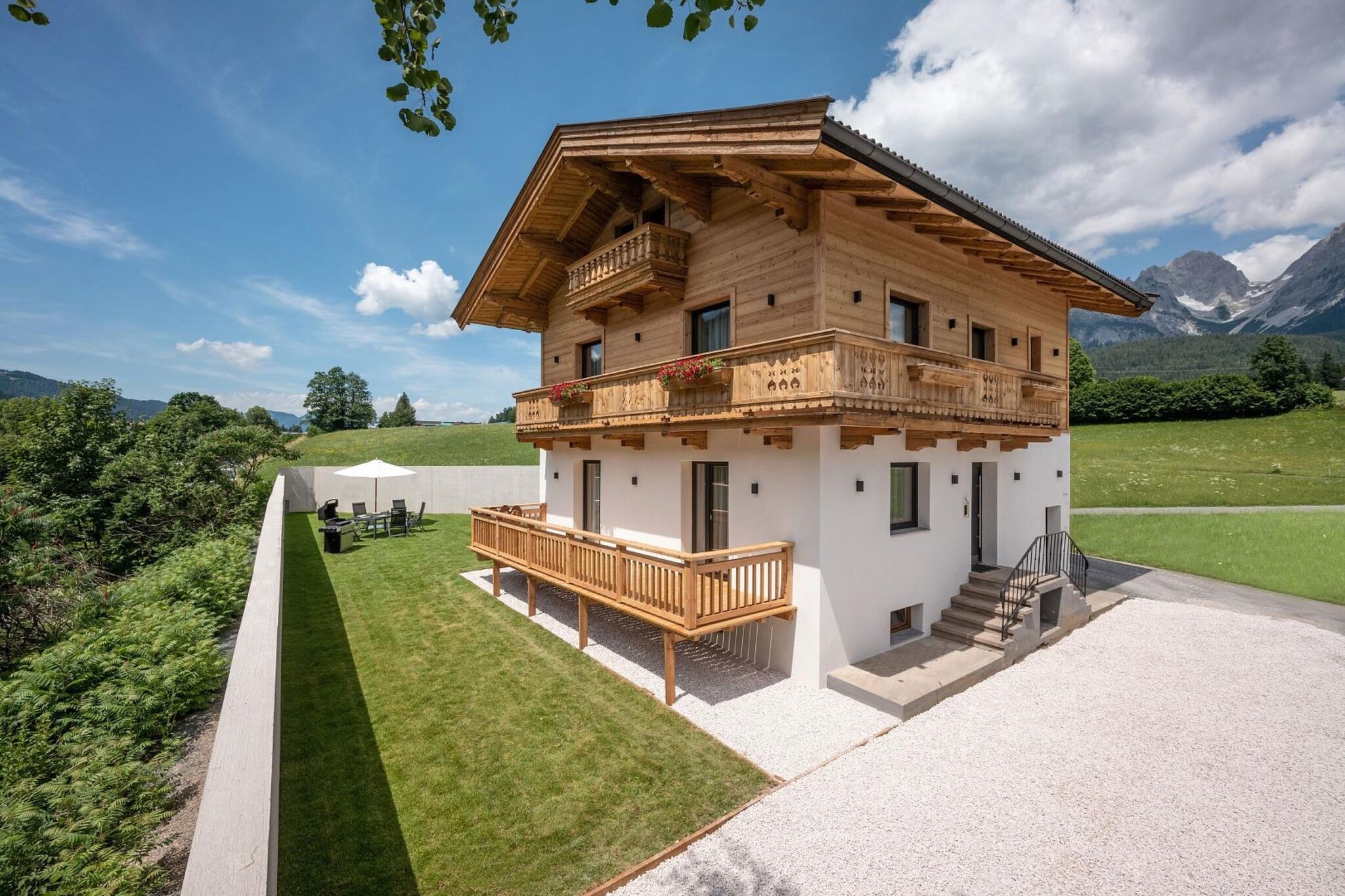 Look forward to this new holiday home in Prama in Tyrol with a large garden and a dream view of the Wilder Kaiser! It is suitable for groups and families who appreciate traditional architecture, modern comfort and lots of space.
The small town of Prama is just 5 minutes by car from Ellmau in the Wilder Kaiser holiday region and close to the well-known towns of Kitzbühel and St. Johann in Tirol. This holiday region is incredibly diverse and, in addition to mountain and winter sports, as well as golf and swimming, also offers unusual activities such as llama trekking and film hikes in summer.
A well-equipped kitchen including a dishwasher, a large couch for cozy evenings, several televisions, air conditioning and a large garden with seating, dining and barbecue facilities in combination with a fantastically beautiful location promise a wonderful holiday in Austria.
"
About Belvilla
When you stay in a Belvilla home, you can rest assured of a unique holiday home in ideal surroundings at an attractive price. The portfolio of accommodations consists of more than 40,000-holiday homes in 20 European countries. Interested in a weekend getaway, a summer or winter sports holiday or simply a short break? Do you prefer the coast, the countryside or the mountains? Whatever your preference, there is a Belvilla home to meet your needs, from a cosy gîte for two to a castle big enough for the entire family, from an apartment in the heart of Rome to a cabin in the middle of nowhere, from a simple tree house to a luxury dream villa and from close to home to the other side of Europe.
A Belvilla home gives you the freedom to enjoy breakfast in your pyjamas or continue a good conversation into the morning hours without having to worry about the bar's closing time. Prepare gourmet meals with fresh local ingredients in your own kitchen and take advantage of having your own swimming pool to do as many cannonballs as you want! In other words, you can enjoy complete privacy in your home away from home.