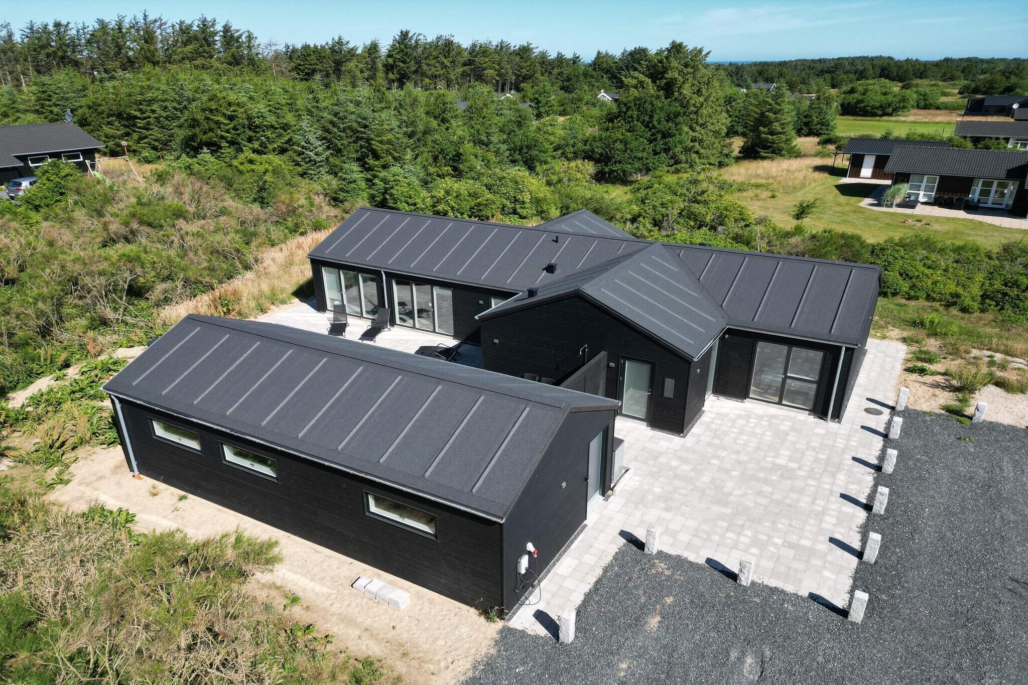 Internet Access DSL, Living room(high chair), Kitchen(cooker(electric), hood, coffee machine, microwave, dishwasher, fridge-freezer), Living/bed room(TV, stereo unit, chromecast), bedroom(double bed, cot), bedroom(double bed), bedroom(double bed), bedroom(double bed), bedroom(2x single bed), bathroom(washbasin, shower, toilet), bathroom(tumble dryer, washbasin, toilet, washing machine), Bubble bath(indoor, heated, 2 persons), Bubble bath(outside, 4 persons), sauna(indoor, 4 persons), heating(electric), terrace, garden furniture, table football, darts, billiards, air to air heatpump