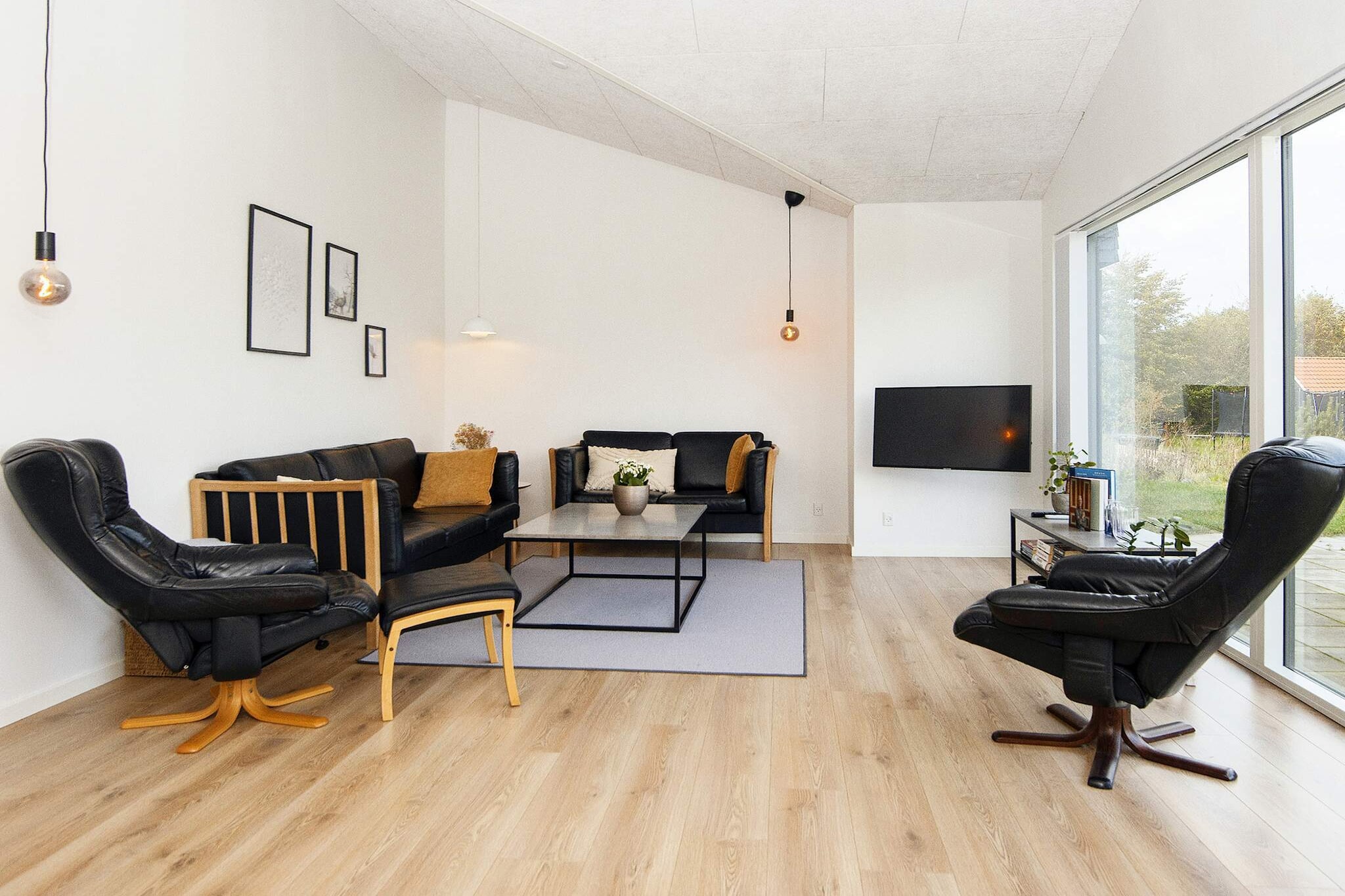 Kitchen(cooker(electric), hood, coffee machine, microwave, dishwasher, fridge-freezer), Living/bed room(TV, high chair, chromecast), bedroom(double bed, children\'s bed), bedroom(double bed), bedroom(double bed), bedroom(double bed, bunk bed), bathroom(floor heating)(tumble dryer, washbasin, shower, toilet, washing machine), bathroom(floor heating)(washbasin, shower, toilet), balcony or terrace, heating(electric), terrace, garden furniture, table tennis table, geothermal energy