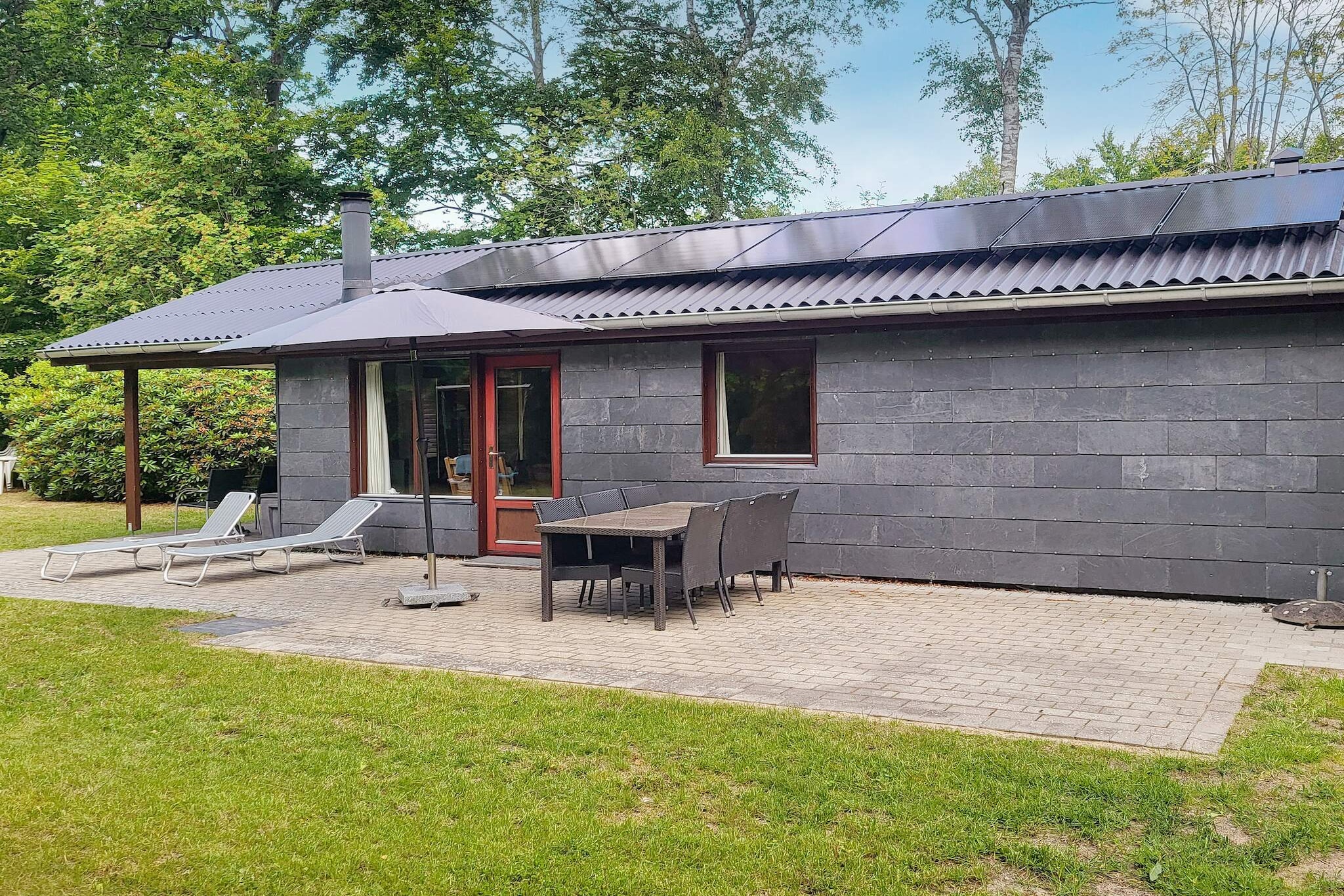 This traditional holiday home is located in the heart of Fjellerup Strand, just steps from the child-friendly shoreline, and offers a charming retreat for families or small groups. The property features two comfortable bedrooms and a cozy living area with an integrated dining space, making it ideal for shared meals and relaxing evenings together. A pellet stove ensures warmth and a welcoming atmosphere on cooler nights. Outside, a 45 m² terrace provides the perfect spot to enjoy the Danish sunshine or host relaxed barbecue evenings. For added fun and relaxation, the property includes an outdoor bathing tub, allowing you to soak under the open sky while taking in the peaceful surroundings. The combination of indoor comfort and outdoor amenities makes this home a perfect choice for those looking to unwind by the coast. With its prime location at Fjellerup Strand, you are just a short stroll from sandy beaches where children can play safely, while nearby paths and natural surroundings offer opportunities for walks and exploration. Blending traditional charm, modern conveniences, and outdoor leisure, this holiday home provides a memorable seaside escape for families and friends. Please note: rental to youth groups is not permitted.A refundable deposit might be charged closer to your check-in date. The security deposit ensures a smooth stay and covers any additional services or consumption charges.This deposit covers utilities consumed during your stay and any additional services that may be taken.The final amount will be adjusted based on actual meter readings, actual usage of extra services, and any remaining balance will be refunded within 21 days after checkout.This deposit simply acts as a prepayment for charges that  you would anyways pay for, ensuring a seamless stay and check-out experience.