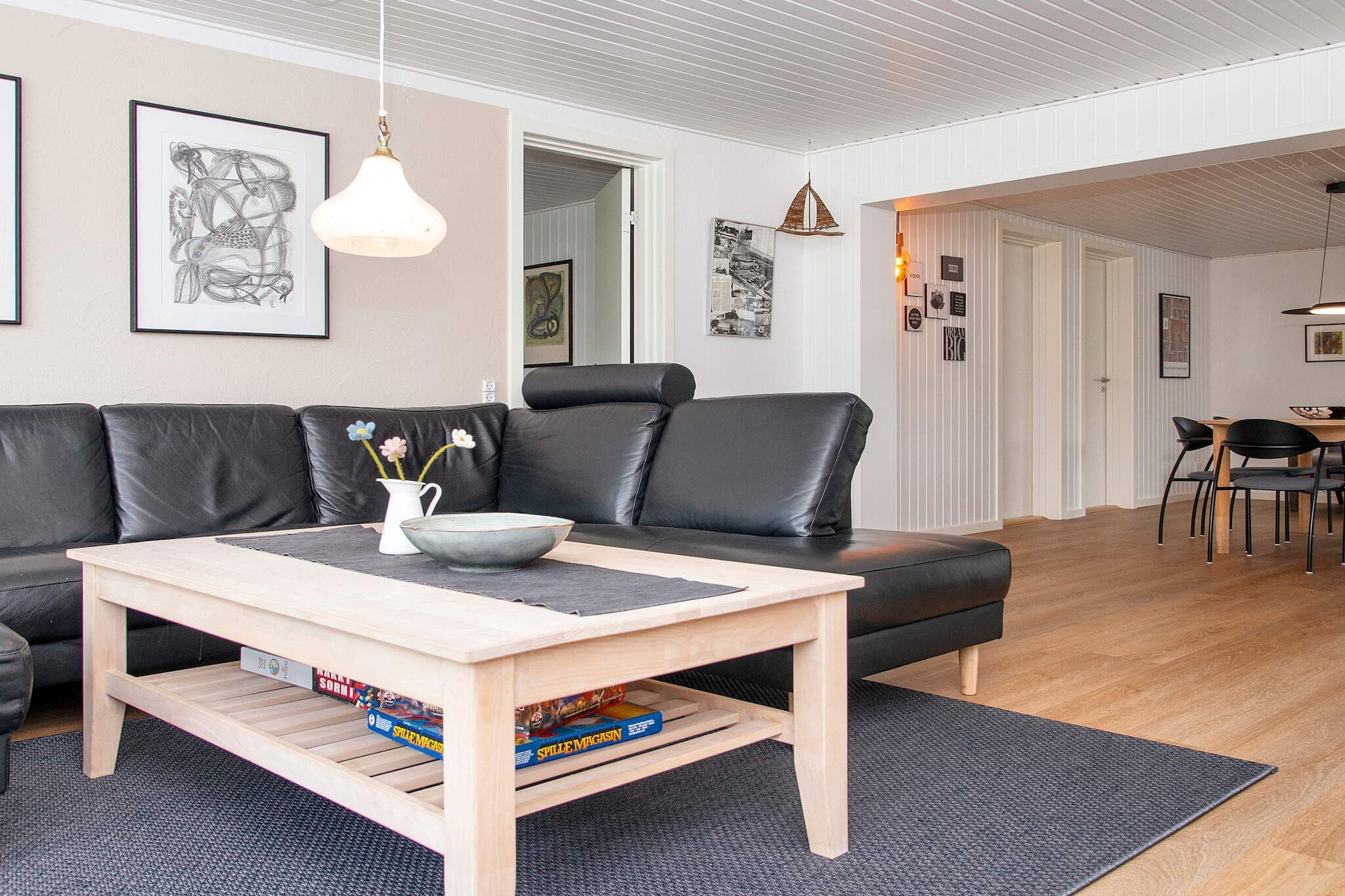 Kitchen(stove(induction), coffee machine, oven, microwave, dishwasher, fridge-freezer), Living/bed room(TV, stereo unit, chromecast), bedroom(single folding bed, double bed), bedroom(2x single bed), bedroom(2x single bed), bathroom(washbasin, shower, toilet), game computer, tumble dryer, bath tub(outside, heated, 4 persons), washing machine, heating(electric), terrace, garden, garden furniture, air to air heatpump