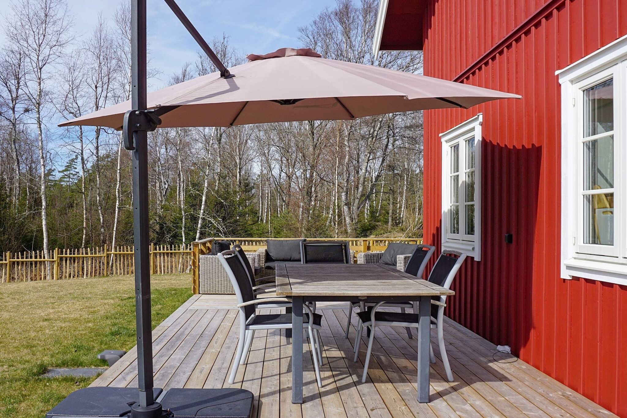 Annex: (2x bunk bed)\n\nInternet Access DSL, open kitchen(cooker(electric), hood, coffee machine, oven, microwave, dishwasher, fridge-freezer, high chair, water from well), Living/bed room(TV(swedish TV channels)), bedroom(2x single bed), bedroom(2x single bed), bedroom(2x single bed), bathroom(floor heating)(washbasin, shower, toilet, washing machine), bathroom(floor heating)(washbasin, toilet), terrace, garden furniture, BBQ, parking, geothermal energy, air to air heatpump