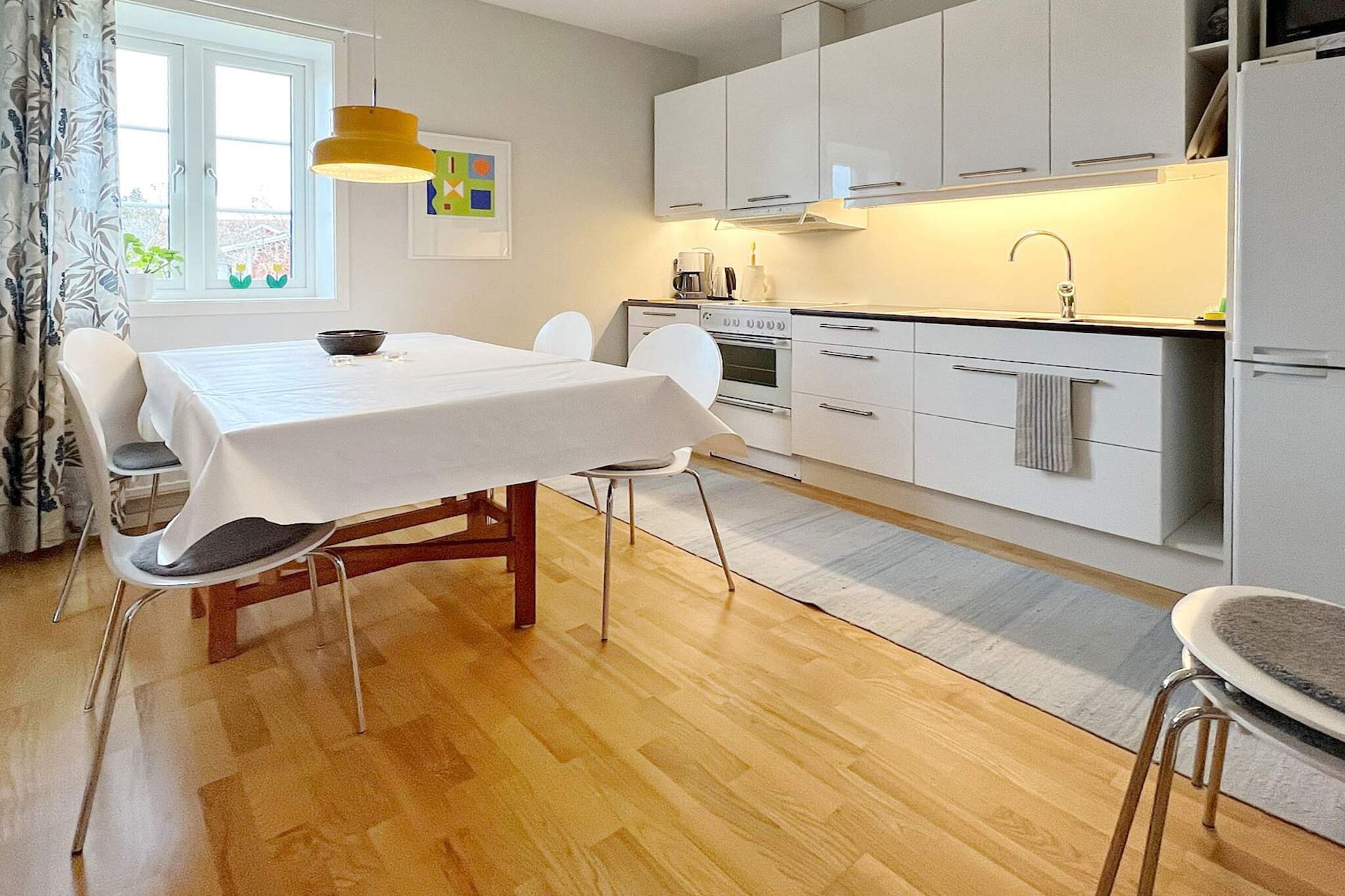 open kitchen(cooker(electric), hood, coffee machine, microwave, fridge-freezer), Living/bed room(TV(swedish TV channels), DVD player, radio), bedroom(4x single bed), bathroom(washbasin, shower, toilet, washing machine), heating(electric), garden furniture, BBQ, parking