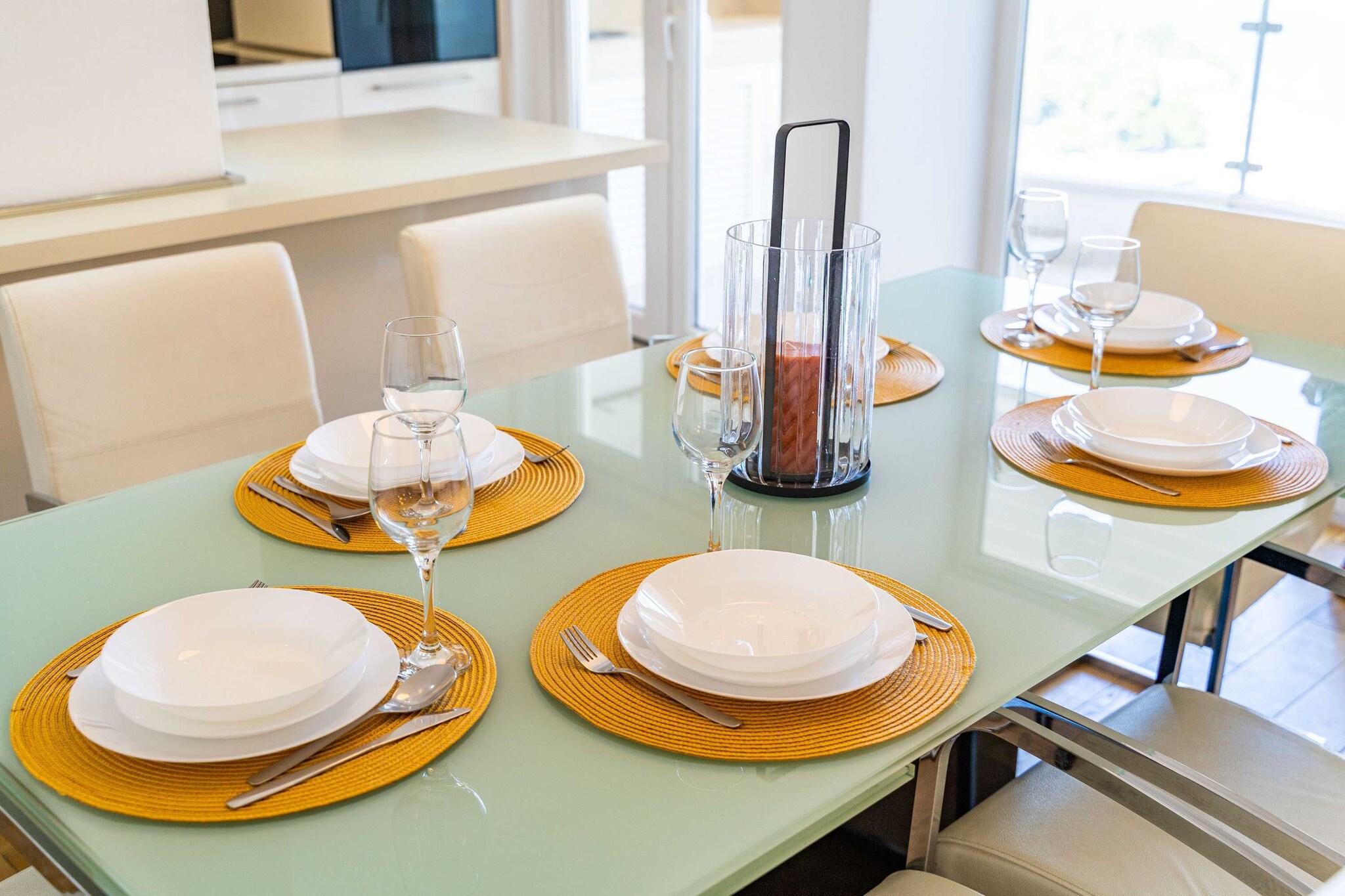 On the 2nd floor: (Kitchen(oven, dishwasher, fridge, freezer, washbasin), Living/bed room(2x single sofa bed, TV, dining table, seating area), bedroom(double bed), bedroom(small double bed), bathroom(shower, washbasin, washing machine))\n\nhood, balcony, air conditioning, ironing board, iron, hairdryer