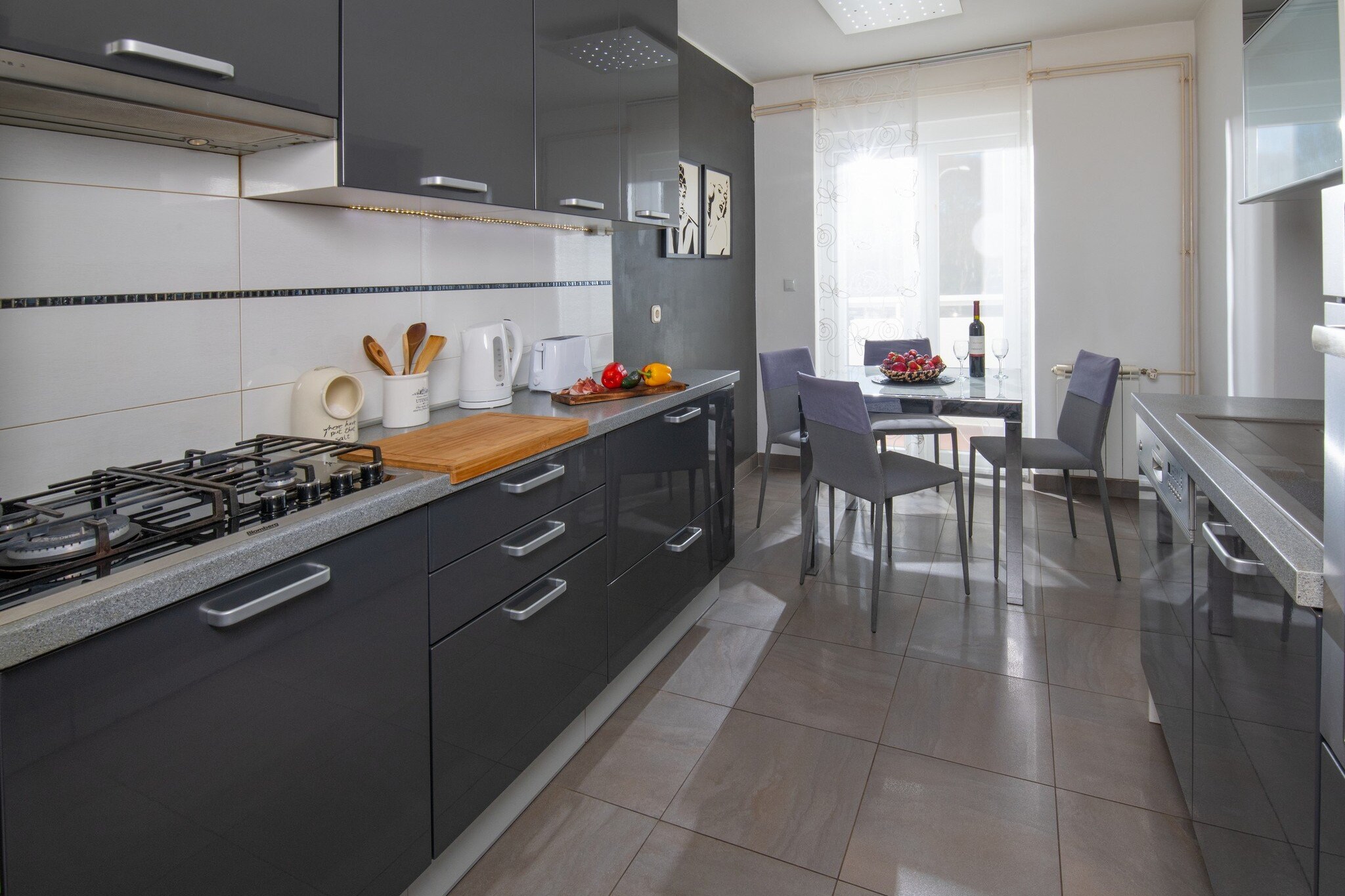 Apartment Point is located in the center of Pula, the largest city in Istria County. The city is best known for its preserved ancient Roman buildings of which the most famous is the first-century amphitheater popularly called the Arena.
This apartment offers accommodation with a furnished private balcony.  It features air conditioning.  Free Wi-fi is available through the property. 
The baby cot is available on request. 
Pets are not allowed. 
Public parking is available.

This two-bedroom apartment with a balcony can perfectly fit up to four people. It features air-conditioning as well as Cable LCD TV. The kitchen comes with an oven, refrigerator, water kettle, microwave, dishwasher, and toaster. Both bedrooms are furnished with a large double bed. The private bathroom comes with a shower and toilet. 
This apartment is located on the first floor.

Thanks to the great location everything you need for maximum enjoyment of your vacation you will find in the neighborhood. 
The apartment is 500 m away from the main bus station and 250 m away from the port.
Restaurants with Istranin couise are only 300 m away.  Bars and cafes, as well as a supermarket, are only 100 m away. The closest beach is 2 km from the property. 
All the most famous tourist and historical attractions are within the walking distance of the property.

Pula airport is only 3,5 km away.