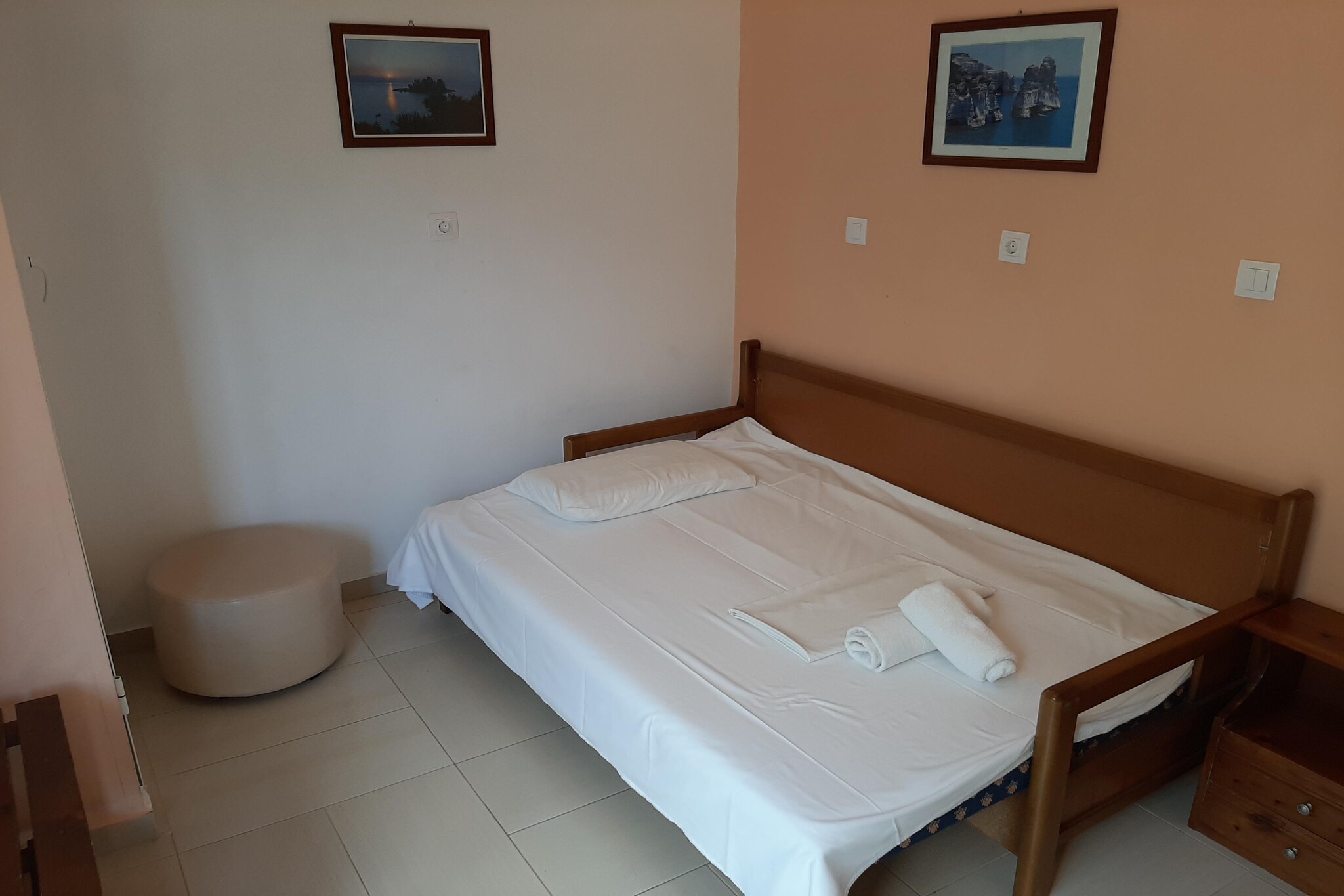 Are you looking for a peaceful vacation surrounded by good views and nature? This apartment in Mpenitses, Greece is the best place to unwind on your vacation goals. With a beautiful terrace overlooking the sea views, this apartment is ideal for a family stay. 

The property is surrounded by many beautiful beaches and seashores that are worth exploring. Also, you are close to the center so make sure to take full advantage of it by shopping and eating your hearts out. Buy the essentials from the supermarket located at a short distance. 

The air-conditioning ensures the house remains cool in the summers. In the shared pool, you can enjoy refreshing dips or relax by the poolside on the sun-loungers. Close the day with a drink of your choice at the bar. The parking facility is also available here. 
