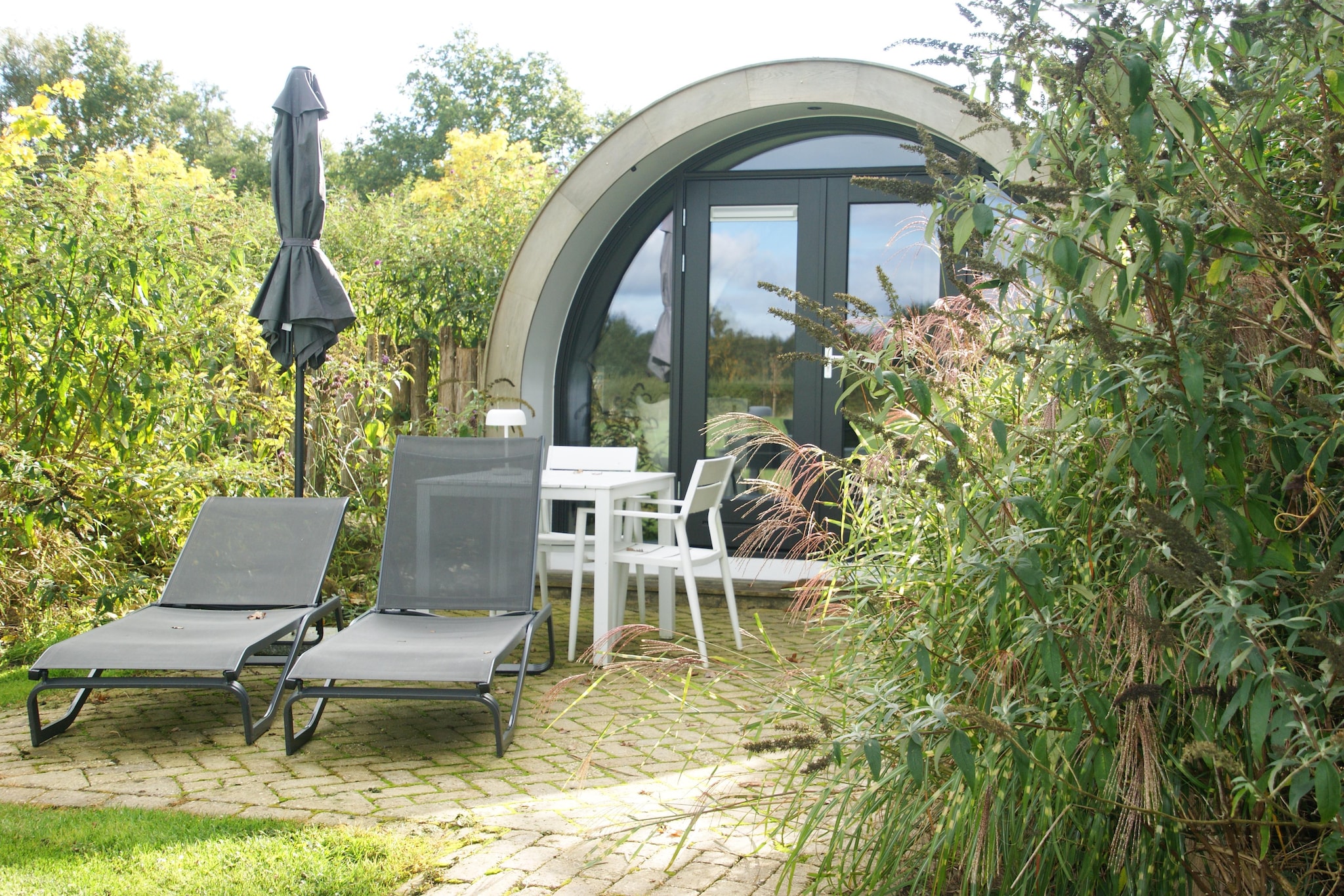Wellness lodge Wulp 2p - Buitenkant zomer