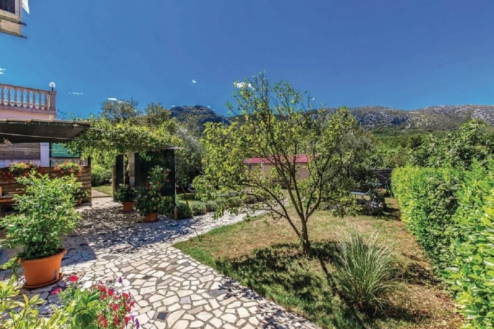 Inviting apartment in Tribalj with garden