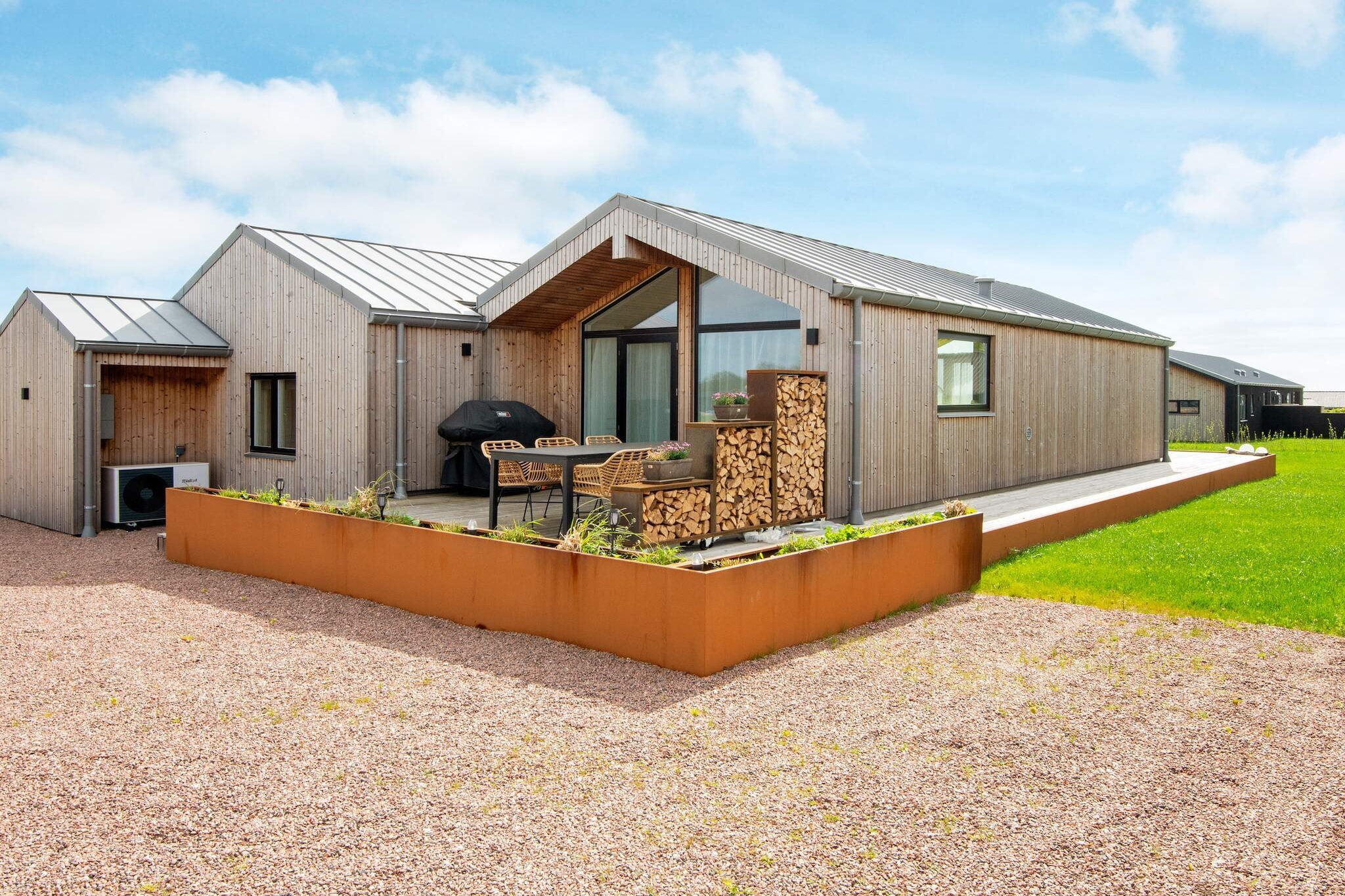 This vacation home near Kelstrup, not far from the German border, offers a very attractive setting for your next vacation on the Danish Baltic Sea coast! The house also offers beautiful views of the water in the Little Belt and the surrounding nature! The centerpiece of the vacation home is the spacious kitchen/living area with an open ceiling up to the ridge and floor-to-ceiling windows for daylight and views. This room also provides access to the large terrace area with sea views. The large, bright rooms of the house contribute significantly to the feeling of well-being. There are also four bedrooms with comfortable beds. After an active day outdoors or a long walk along the charming coastline, you can relax in the warm water of the hot tub in the evening. A practical outdoor shower is available for showering beforehand. The modern amenities in the vacation home also include a dishwasher, washing machine, dryer, charger for electric cars, climate-friendly heat pump, free Wi-Fi, and TV with Chromecast for streaming your own providers. Outside, the 130 mÂ² of terrace space invites you to relax in the sun or shade, as around 15 mÂ² of the terrace is covered. This means you can spend your vacation outdoors. A gas grill is available, and the owner has already provided a spare gas bottle. From June 21, 2025, a swing, sandpit, and table soccer will be available. A day trip to the island of Ã…rÃ¸ is one of many possible excursion destinations. The island is known for its beautiful nature and also has a winery and the Ã˜lbryghus brewery to offer. Or you can book a ferry trip to the small island of BarsÃ¸. You can also visit the UNESCO town of Christiansfeld or go shopping in SÃ¸nderborg. No rentals to youth groups!A refundable deposit might be charged closer to your check-in date. TheÂ securityÂ depositÂ ensuresÂ aÂ smoothÂ stayÂ andÂ coversÂ any additionalÂ servicesÂ orÂ consumptionÂ charges.ThisÂ depositÂ coversÂ utilitiesÂ consumedÂ duringÂ yourÂ stay andÂ anyÂ additionalÂ servicesÂ thatÂ mayÂ beÂ taken.TheÂ finalÂ amountÂ willÂ beÂ adjustedÂ basedÂ onÂ actualÂ meter readings,Â actualÂ usageÂ ofÂ extraÂ services,Â andÂ anyÂ remaining balanceÂ willÂ beÂ refundedÂ withinÂ 21Â daysÂ afterÂ checkout.ThisÂ depositÂ simplyÂ actsÂ asÂ aÂ prepaymentÂ forÂ chargesÂ that Â youÂ wouldÂ anywaysÂ payÂ for,Â ensuringÂ aÂ seamlessÂ stayÂ and check-outÂ experience.