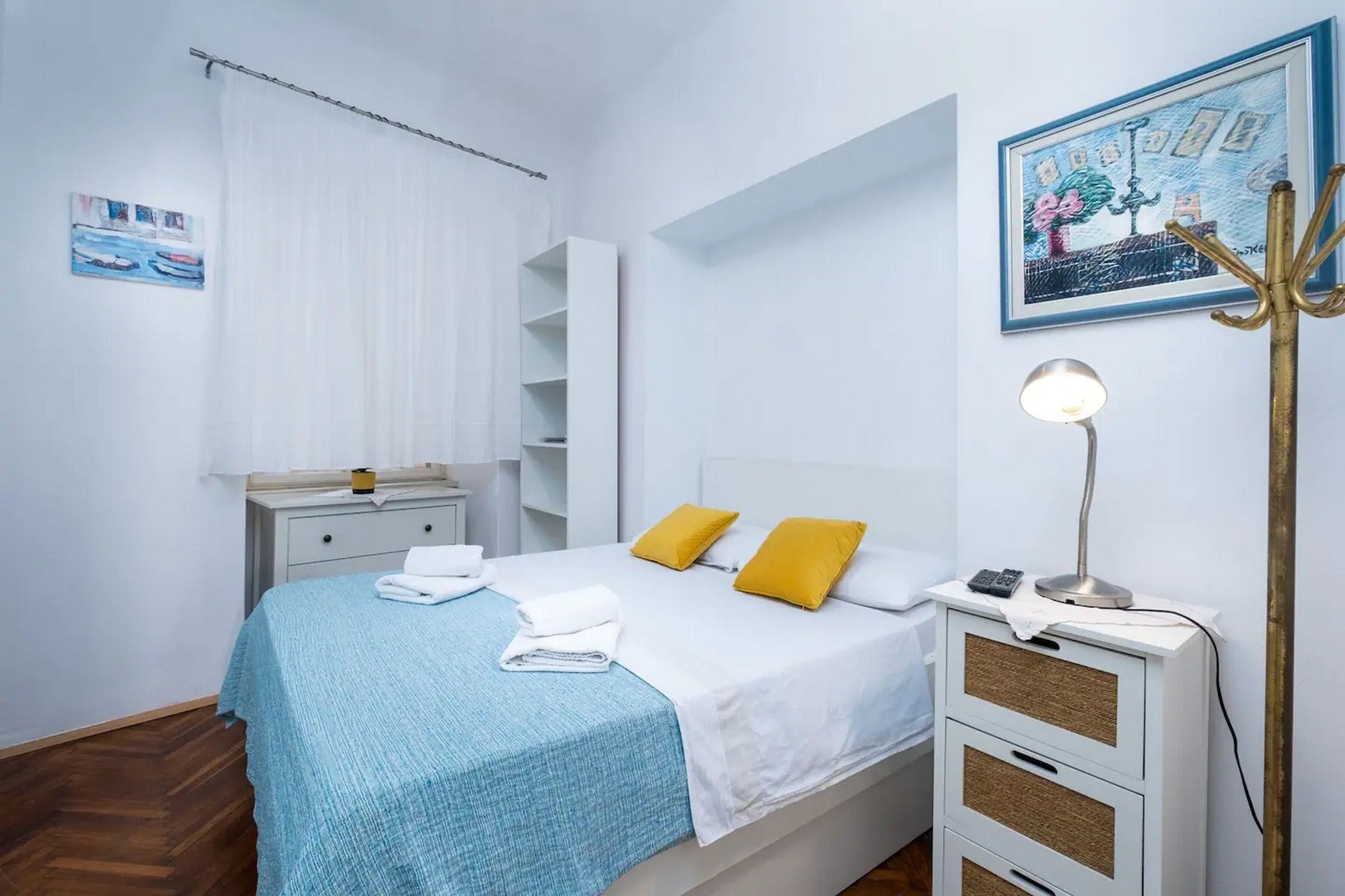 On the 1st floor: (Kitchen(dining table, electric kettle, toaster, hood, coffee machine, oven, microwave, fridge, freezer, washing machine), Living/bed room(single sofa bed, TV, seating area), bedroom(small double bed, iron), bedroom(small double bed), bathroom(toilet, shower, washbasin))\n\nair conditioning, ironing board, hairdryer