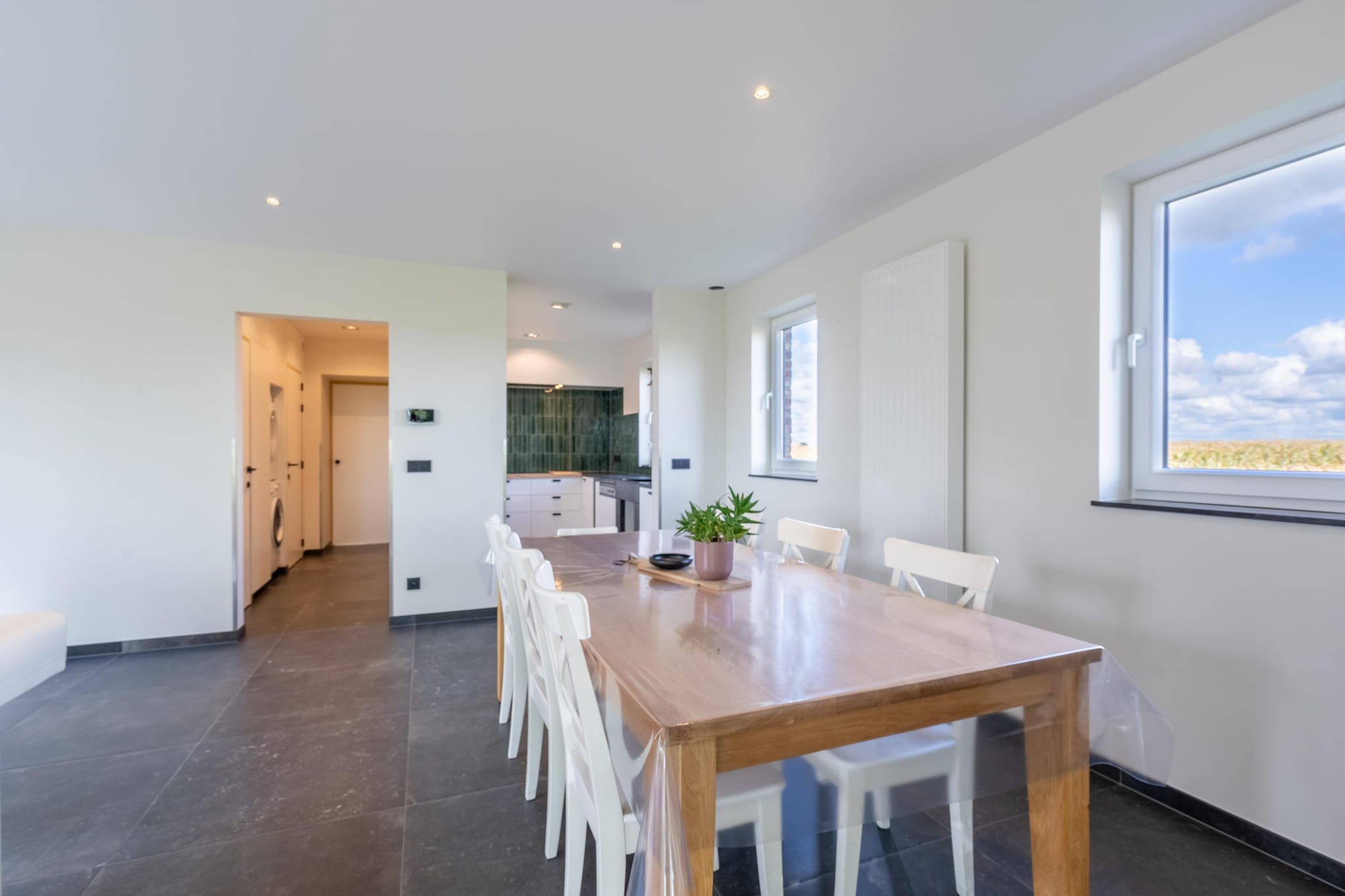 Ground floor: (Living room(TV, dining table, seating area), Kitchen(coffee machine, oven, microwave, dishwasher, fridge, freezer))\n\nOn the 1st floor: (bedroom(single bed, double bed), bedroom(double bed), bathroom(tumble dryer, shower, washbasin, toilet, washing machine))\n\nrecreation room, washing machine, terrace(roofed, 60 m2), garden(fenced, > 1000 m2), garden, bicycle storage, garden furniture, sun loungers, BBQ, parking, trampoline, pond, boules court, table tennis table, billiards, children\'s bed