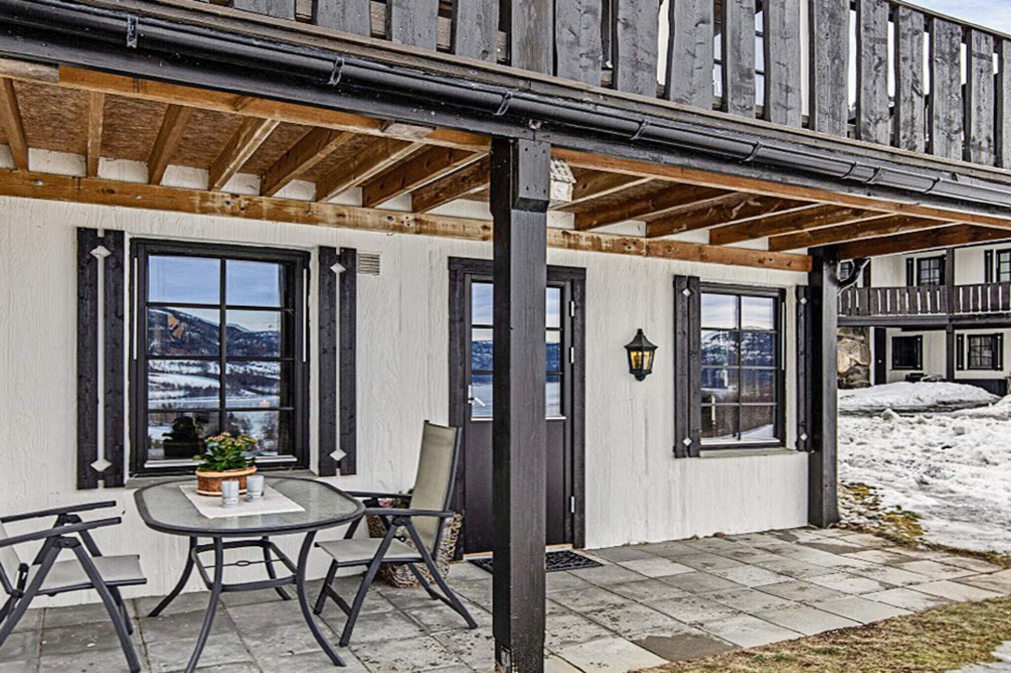 Lovely apartment with ski in/out. The apartment is located one minute walk from the alpine slope, with great views of the Krøderfjord. Norefjell ski resort has 14 lifts and 31 slopes. Light trail for cross-country skiing close by. The apartment is beautifully decorated to a high standard. Two bathrooms with toilet and shower, sauna for 8 people with entrance from the bathroom. Three bedrooms, one with a double bed and two with family bunks. Cozy fireplace in the living room for cold evenings, you need to bring your own wood. There is internet in the apartment. 18-hole golf course with driving range and putting green right nearby. Great bike paths in the area for both the experienced and beginners. It is about 45 km to the bear park which is a great park for both children and adults. The Norefjell area has a variety of fishing opportunities, whether you want to fish in Krøderfjorden and Soneren or in smaller mountain lakes and rivers.