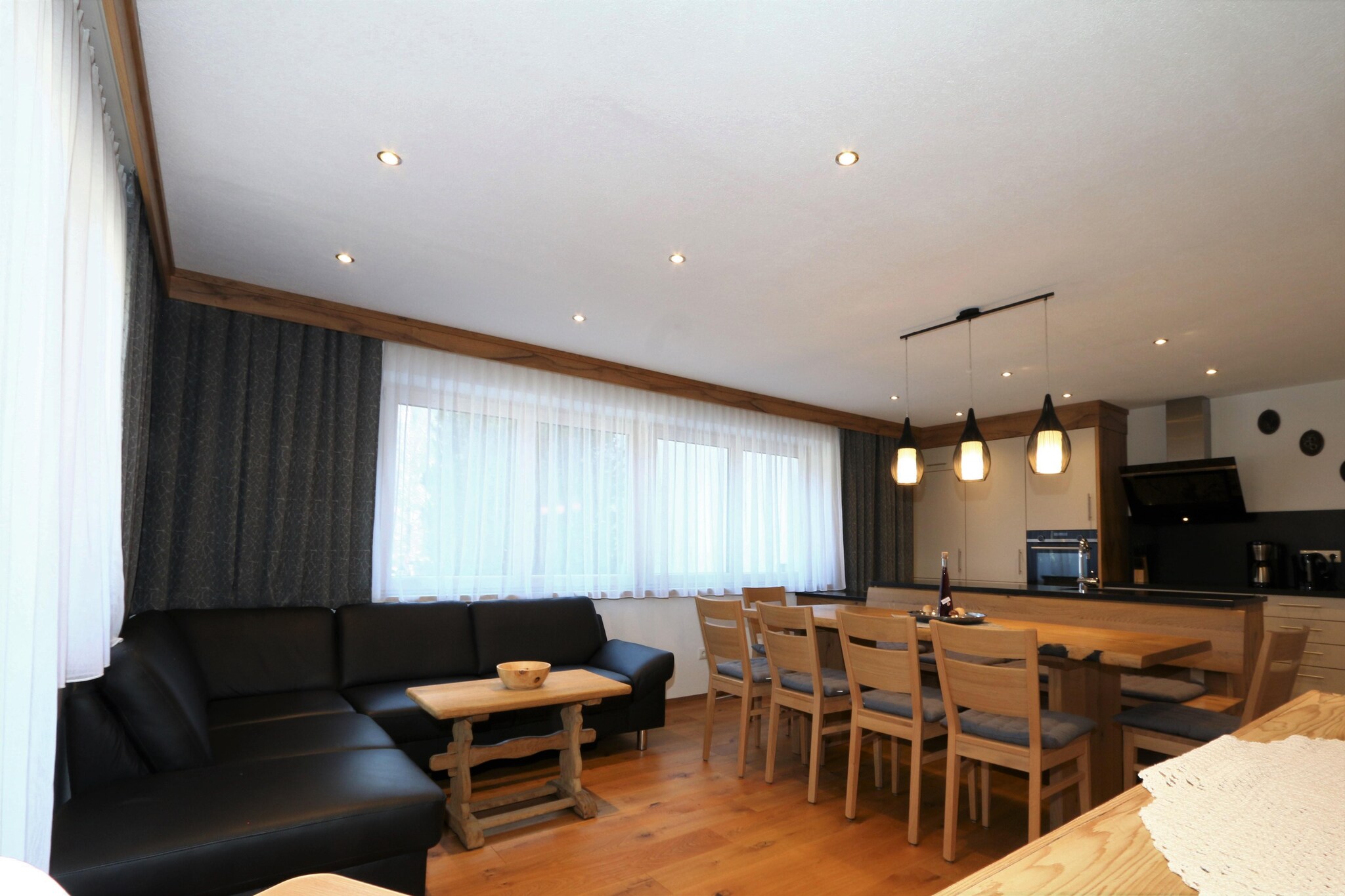 This pretty holiday apartment awaits you in Krimml in the Pinzgau, with the Hohe Tauern National Park right in front of the door, in one of the most beautiful holiday regions in Austria. In 2021, the apartment was lovingly renovated and now offers families and groups of friends with children a comfortable holiday in a fantastic location. There are balconies where you can linger with your morning coffee, enjoy a wholesome breakfast and unwind after an active day outdoors. The ski storage will let you be equipped to enjoy skiing on the go.

Located in the district of Oberkrimml, you will find everything in the immediate vicinity: supermarket, bakery and pubs, but also the ski bus stop and the public swimming pool. Krimml is famous for the highest waterfalls in Europe, which are located directly on the southern outskirts of Oberkrimml. You can enjoy cross-country skiing only 2.5 km away from your stay. You will find supermarkets only 250 m away, in case you want to purchase essentials and groceries and there are restaurants also almost on your doorstep away for enjoying local cuisines.  
 
The high-quality holiday apartment, equipped with mattresses and linen suitable for allergy sufferers, impresses above all with its friendly, modern furnishings with lots of wood. The living room, but also each bedroom has satellite TV. In the entrance area, you also have the option of storing your skis and ski boots in the ski room. The open kitchen is well-equipped for self-catering and preparing scrumptious home-cooked meals.The property features 3 bedrooms with comfortable double beds each so the guests can enjoy a sound sleep. The home has access to free WiFi throughout the property, so you can enjoy unlimited wireless streaming. 

The ski bus stops only 180 m from the property, while the ski lift of Neukirchen-Wildkogel is only 10 km away.