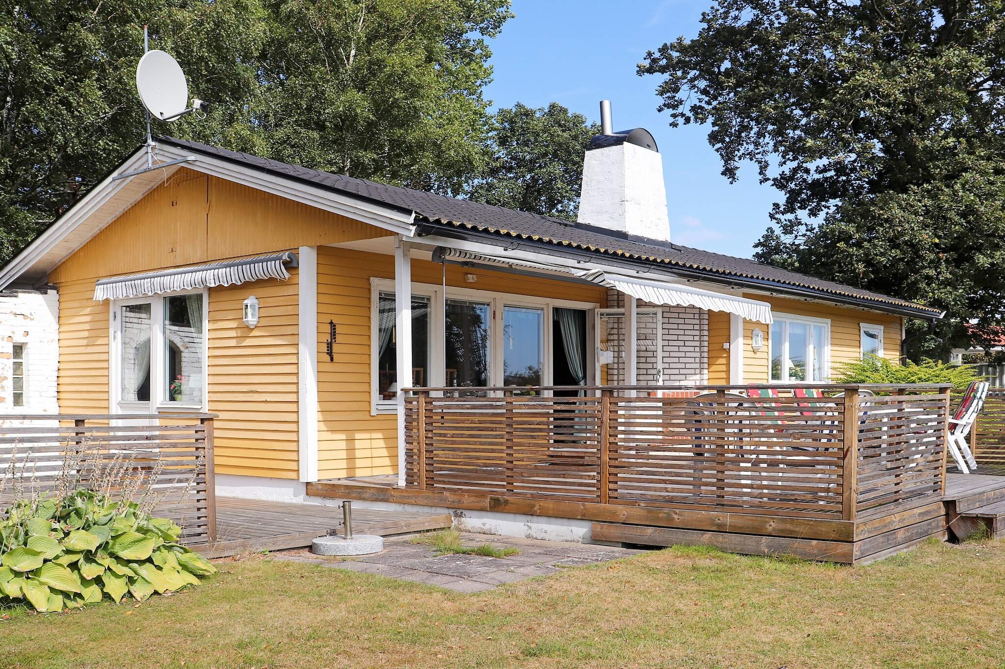 Kitchen(cooker(electric), hood, coffee machine, microwave, fridge-freezer), Living/bed room(TV, radio, CD player), bedroom(double bed), bedroom(2x bunk bed), bathroom(washbasin, shower, toilet), heating(electric), terrace(roofed), garden, garden furniture, BBQ, parking