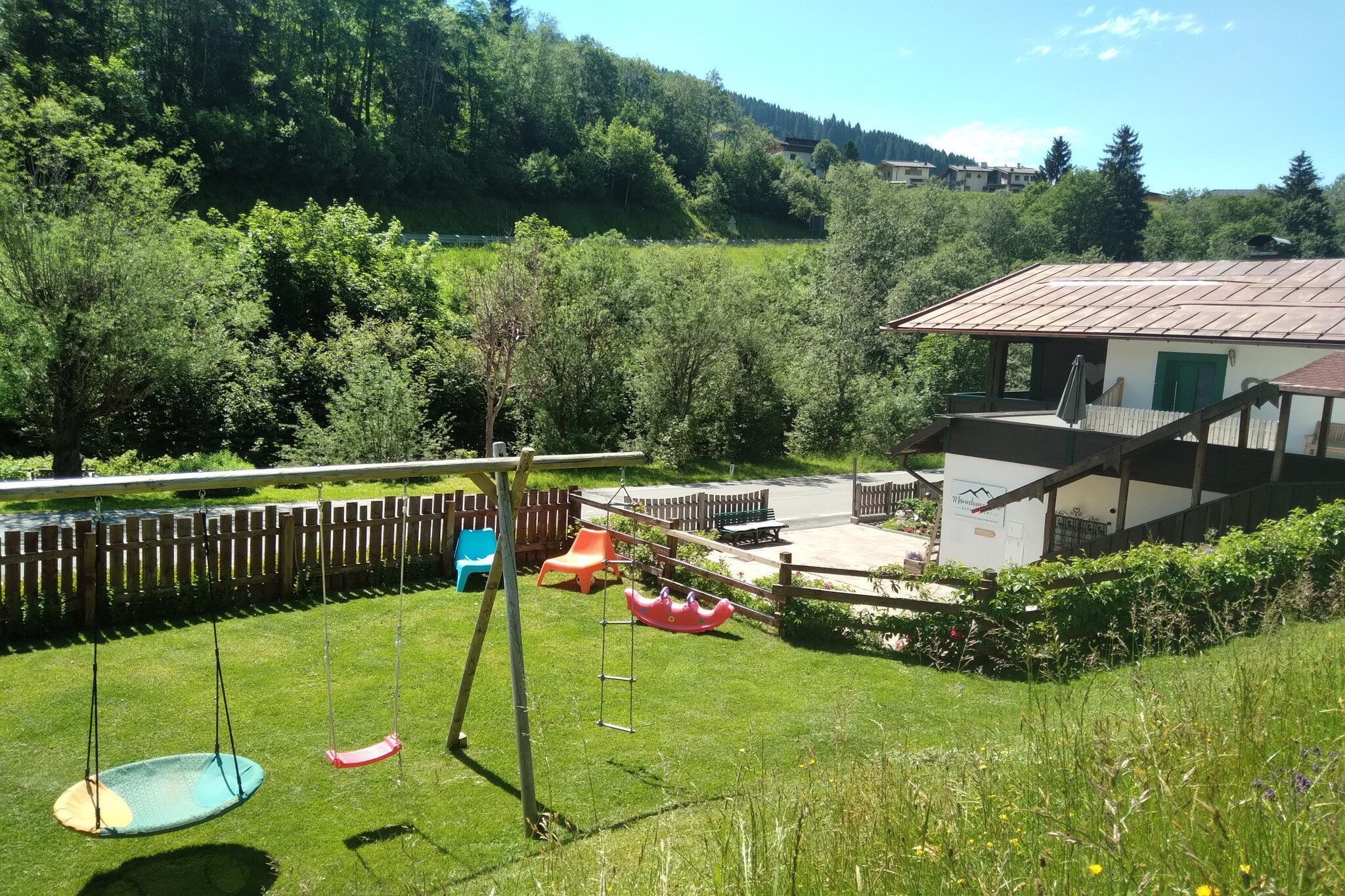 In this cosy and modern furnished holiday flat in Dienten am Hochkönig you will immediately feel at home! Families, couples, friends, and everyone can relax and unwind in this great holiday home with a dream view of the Hochkönig from the balcony.
You can start walking directly from the flat because in just a few minutes’ walk you can reach the centre of Dienten, which lies at the foot of the Hochkönig where you can shop and relish the delicacies and drinks from the restaurants located in the centre. Here the Bürgalm and Gabühel cable cars take you up to beautiful hiking routes, where wonderful alpine pastures and sunny mountain huts await you. In winter, the Gabühel cable car connects you to the extensive Hochkönig-Maria Alm-Dienten ski area. Alternatively, you can take the free bus, which is only 50 m away from the house. The centre of Bischofshofen is 20 km away from the apartment.
Particularly practical about this flat is the spacious entrance area with plenty of room for jackets and shoes, as well as the ski room with ski boot heating. In the well-equipped kitchen that has a cooker, toaster, etc. you can prepare home-cooked meals and enjoy them in the seating area in the kitchen itself. There is also a bicycle room where you can keep the cycles after exploring the area, 2 covered balconies that are so perfect for relaxing under the sun or admiring the weather and views, and a garden with a large terrace for enjoying meals and drinks, dining table, deck chairs, and playground equipment so that kids don’t feel left out in this vacation. The Hochkönig card, which gives you numerous discounts on mountain railways and leisure facilities, is included in the price of the flat.
The nearest airport, Salzburg is 73 km away from this property.