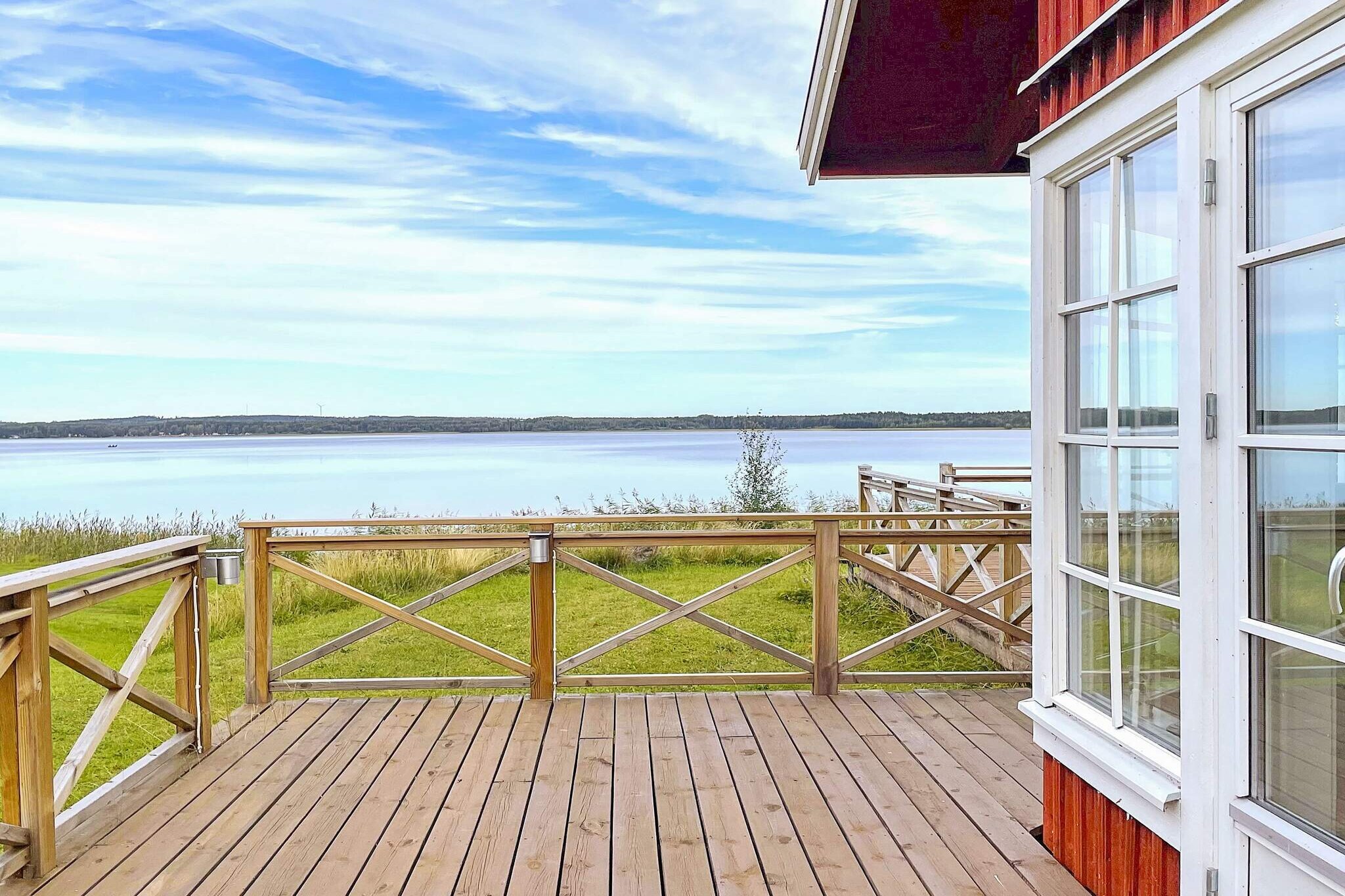 Welcome to stay in a nice house with a lake plot, near the beautiful town of Hjo. The house is located at the bottom of the small road next to MullsjÃ¶n with a large lawn with fruit trees and the lake just below. Enjoy beautiful sunsets, warm days in a quiet child-friendly family area with some summer cottages and houses around. The accommodation is suitable for those who want to live in a quiet environment, enjoy swimming and wonderful excursions. Perfect for families with children, an elderly couple or you in company who want to experience nice environments, bathing places, lake VÃ¤ttern and MullsjÃ¶n as well as the summer town of Hjo. The terrace goes around the whole house where you can sit and sunbathe or barbecue in the evening. You are welcomed into a bright hall with two smaller bedrooms to the left. Both bedrooms each have a bunk bed. The house is brightly furnished with homely dÃ©cor and style. The kitchen and living room have an open floor plan with magnificent views towards the lake. In the kitchen there is a dining area with space for 4-6 people, dishwasher, fridge / freezer, stove with oven. In the large living room stands a large sofa with a table. Adjacent to this room is a small smaller room with TV corner. The sofa is a sofa bed of 140cm wide. Next door is a nice extension that was built in 2017 with great light, spotlight on the ceiling and with comfortable armchairs. In the garden there are apple trees and plums you are welcome to pick and eat. Below the house is a public place where people roam to go to the bathing area. You can swim here but the bottom can be a bit dingy. The larger bathing area is just under 1km from the house. There are bathing jetties, a sandy beach and it is shallow. There are also swings for the children. In the area there are fish-rich streams and lakes where a fishing license is required. The accommodation is not for youth groups under 25 or for companies. Hjo is called the wooden town by Lake VÃ¤ttern. Here you can walk on nice cobbled streets, eat ice cream and check out handicrafts. The nature reserve HjoÃ¥ns DalgÃ¥ng is beautiful with its nature, lush and green path. For those who like to fish, you should go to HÃ¶kensÃ¥s and plenty of berries in the forests. Here you will enjoy yourself excellently. Welcome!