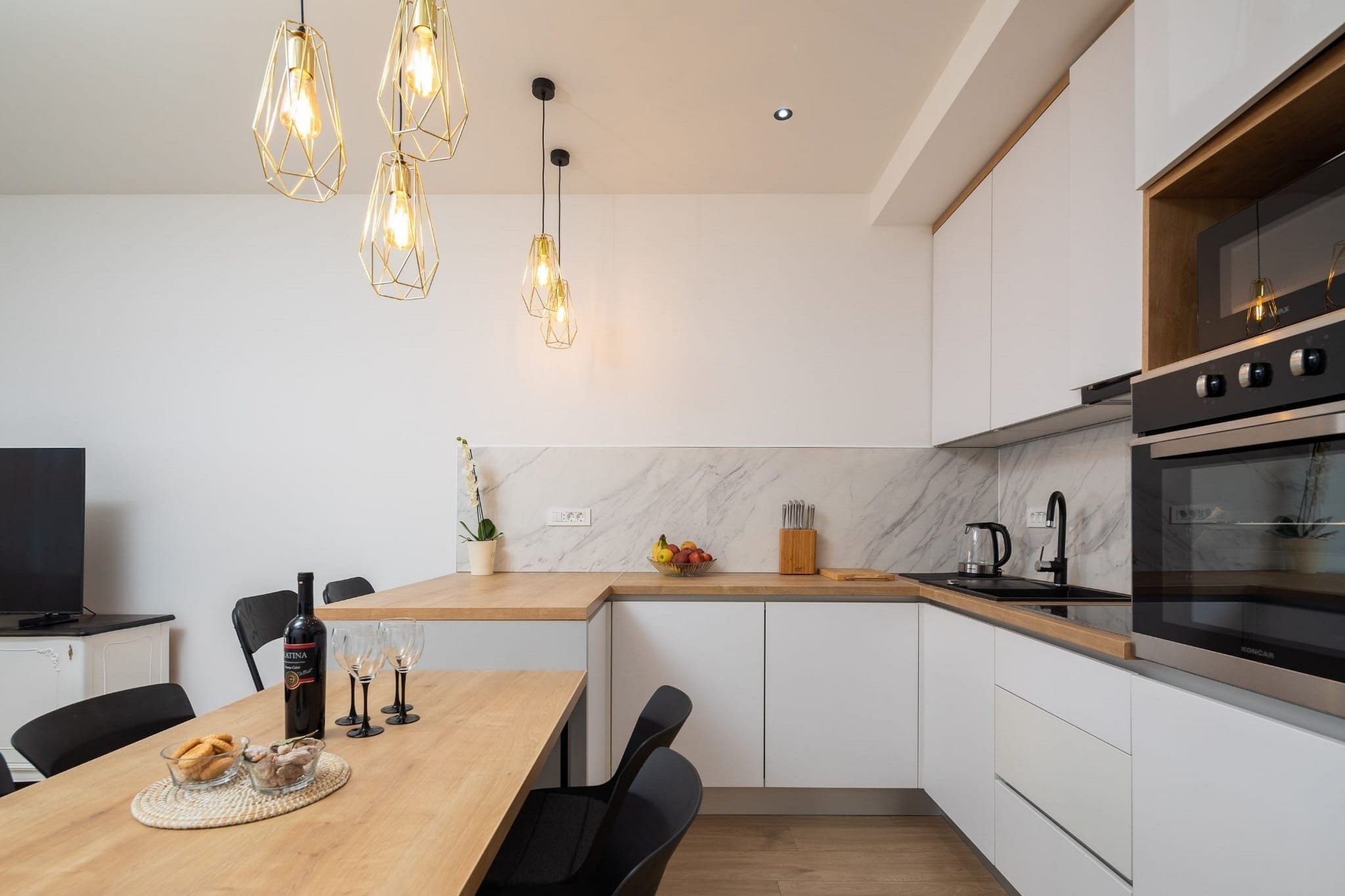 Apartmani Tomas Omiš is located in the center of Stanici, a place known for the most beautiful beach and the cleanest sea. If you want to spend your vacation in a peaceful and quiet environment, far from the city crowds, and also to have nearby all you need during your holidays, Apartments Tomas Omiš is the best choice for you.
It has two units that offer accommodation with a sea view. Children's playground, as well as common BBQ facilities, are at your disposal, which makes this place ideal for a nice and relaxing family or friends vacation. You also have access to a laundry room.
This lovely one bedroom apartment with a private balcony can provide accommodation for up to five people. It features WiFi and a TV. The bedroom is furnished with one double bed and one single bed. Living room with a sofa is combined with dining area and kitchenette. The kitchenette is equipped with a microwave, freezer, trash cans, stove, coffee maker, kitchen utensils, fan, and toaster. Private bathroom comes with a shower and toilet. Free toiletries, a hairdryer as well as linens and towels are at your disposal. The apartment is located on the first floor and it has a private entrance.
Due to the properties good location, everything you may need for a pleasent stay can be found in the neigborhood. Bars, cafes, restaurants are within 10 m from the property, while the beach is only 150 m away from the property. Bus station with direct lines to Omiš and Split is only 20 m away.