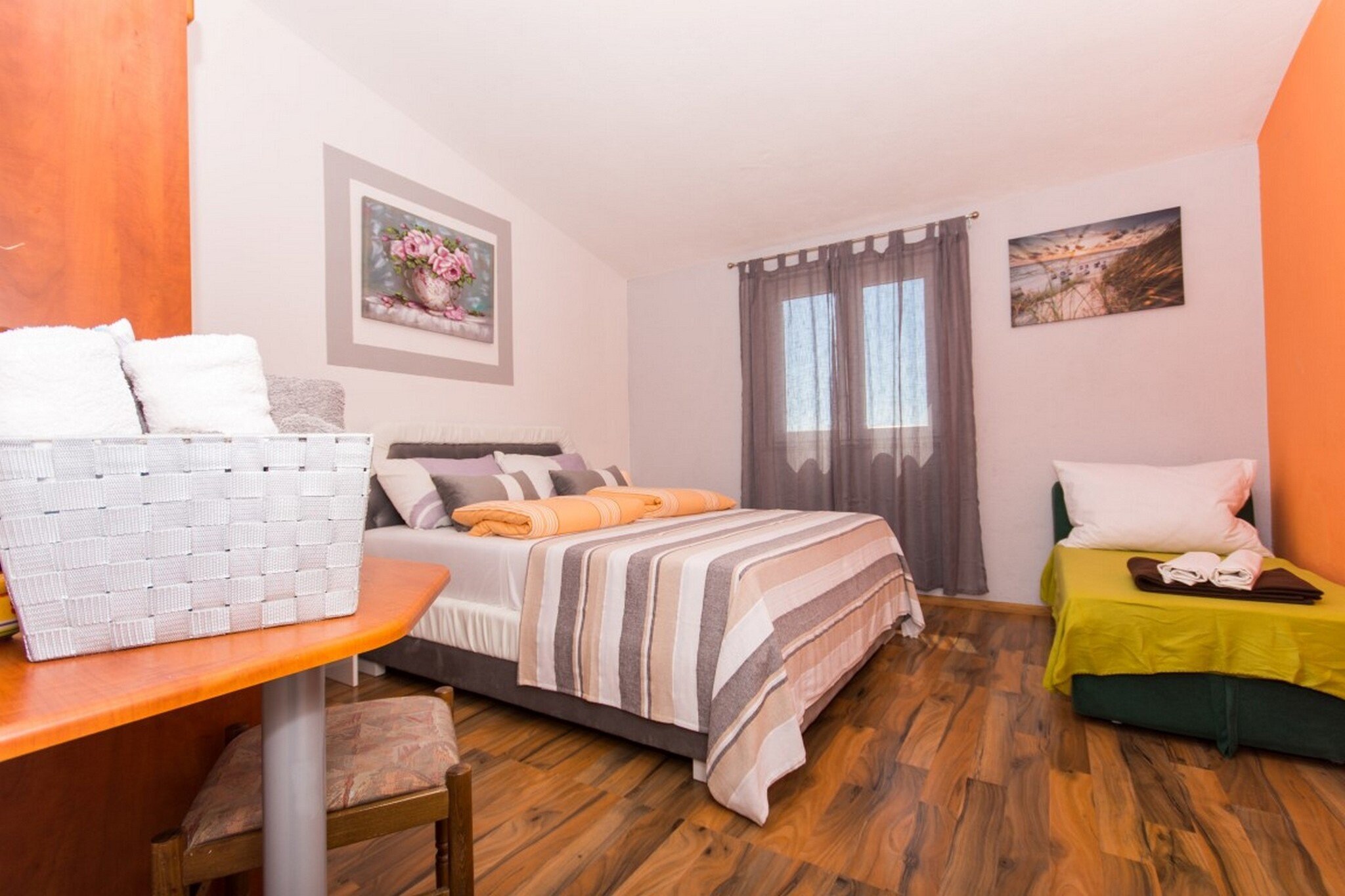 Villa Stil is located in Okrug Gornji located in the beautiful traditional village Okrug Gornji on the Island of ÄŒiovo. Villa Stil is located only 350 m from the beach. 
Spacious terrace fitted with sun beds and parasols as well as a common seasonal outdoor swimming pool and a shared garden are at your disposal.
Free private parking is provided, reservation is not needed.
Pets are not allowed.
Baby cot is available upon request.

This lovely one bedroom apartment with furnished balcony and sea view is perfectly fit for up to four people. It features free air conditioning as well as  LCD TV. The open space living
room comes with sofa and sitting area, and it's combined with the equipped kitchen and dining area. The private bathroom comes with shower and toilet.
Hair dryer as well as linens and towels are at your disposal.

By virtue of property's advantageous location, situated just 350 m from the restaurant and 350 m from the beach and bus stop, guests can find everything they need for every day life during their vacation in the vicinity of apartment. The closest super market is only 350 m away.

Split airport is only 4.60 km away.