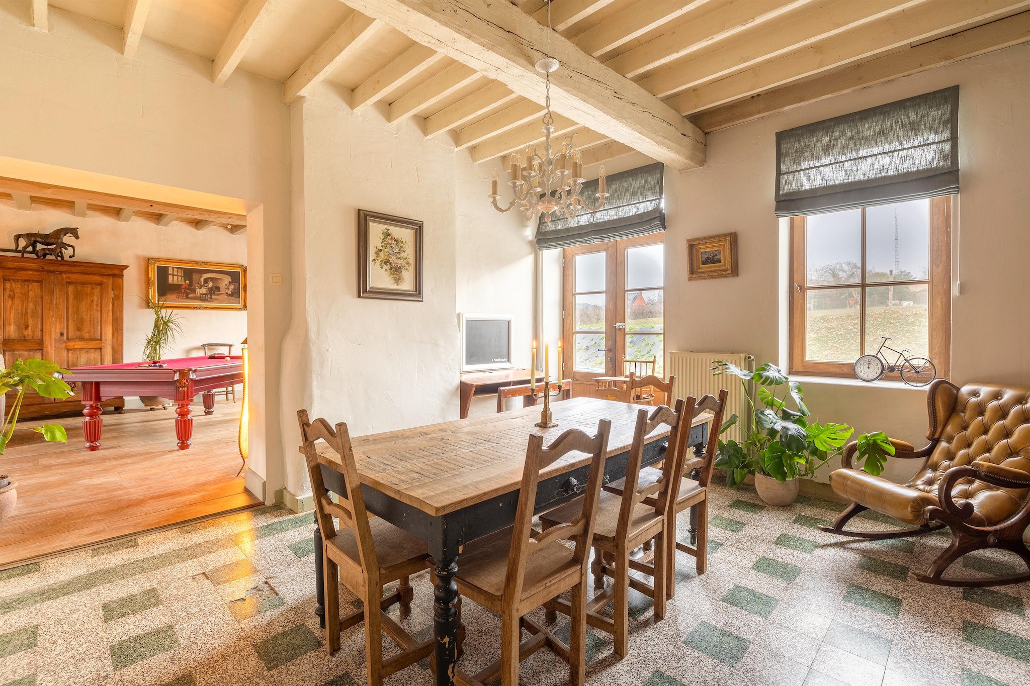 An optional utilities and service fee of EUR 50,00 will be charged before your arrival. Details are given below.<br> Set on an active riding school in Belgian Limburg, this former square farm offers a unique countryside escape for families and horse lovers. With indoor and outdoor arenas, bridleways nearby, and the option to reserve a stable, it's a dream destination for equestrian enthusiasts, Ideal for families, riders, and nature lovers. The home features spacious living areas, a cozy fireplace, and a game room with American pool, perfect for evenings in. Children will love the slides, trampoline, and playhouse, while parents can unwind in the peaceful rural setting. A baby cot and high chair are also available. Explore the Limburg hiking and cycling trails, or visit Sint-Truiden (6 km) for local charm. A snack bar and Greek restaurant are just down the street, making dining out easy and convenient. Extras: - Free WiFi - Pet-friendly (on request) - Ideal for families, riders, and nature lovers. <br><b> Optional Utilities & Service Package </b><br><b> An optional utilities and service package of EUR 50,00 </b> can be selected prior to your arrival. You will receive a separate communication with the payment link should you wish to include it.<br>This package ensures a seamless stay and conveniently covers services such as final cleaning, utility consumption, service support, and protection against minor damages or incidental costs during your stay.<br>Guests who prefer may manage these services independently, provided the property is returned in good order at check-out.