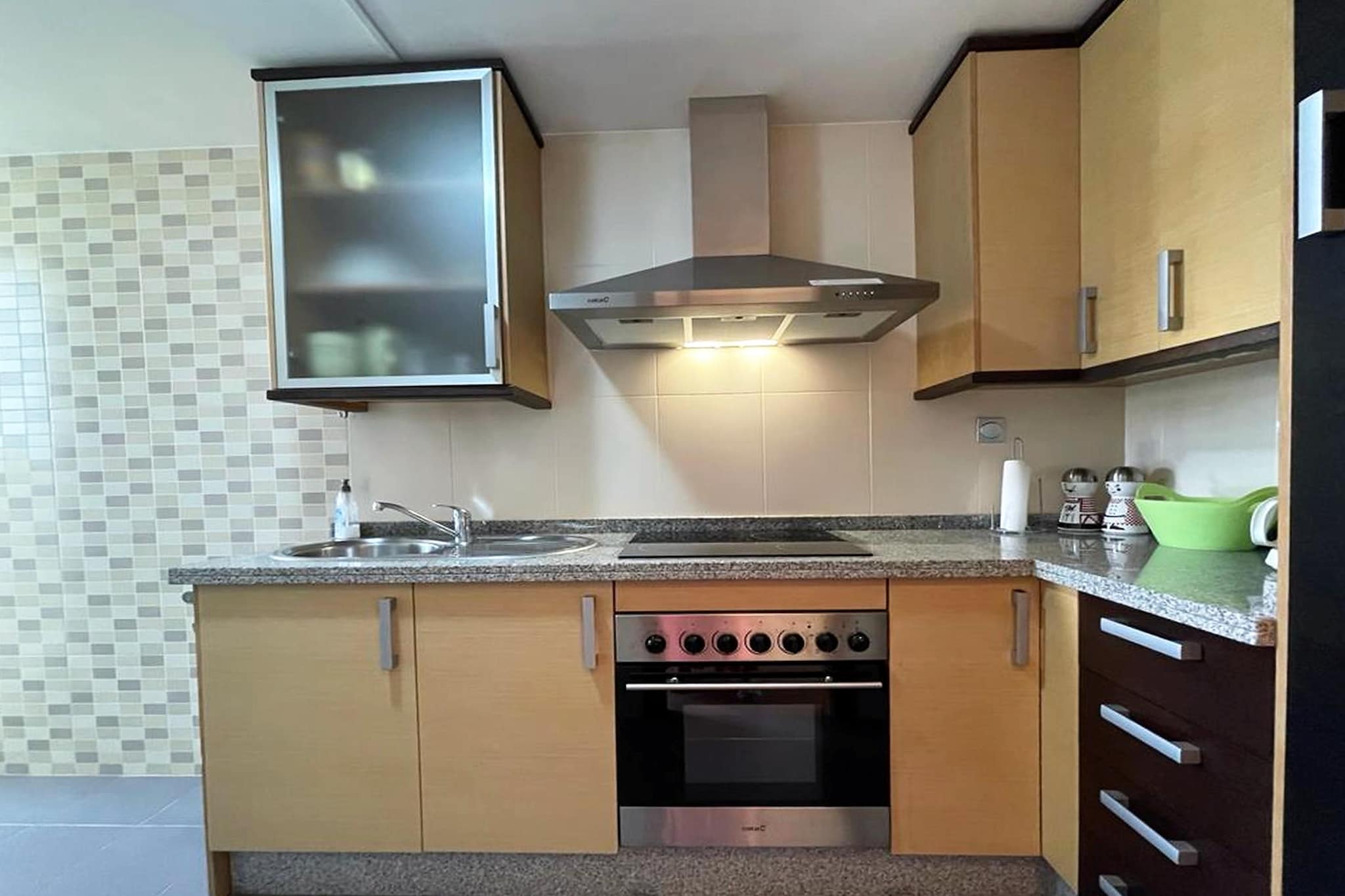 Ground floor: (Entrance(shared entrance, reachable from the outside), lift)\n\nOn the 2nd floor: (Living room(single sofa bed, TV(flatscreen, international television channels), dining table, seating area), Kitchen(hob, toaster, hood, coffee machine, oven, microwave, fridge-freezer), bedroom(double bed(135 x 190 cm)), bedroom(single bed, single bed), bathroom(bathtub with shower, washbasin, toilet), bathroom(shower, washbasin, toilet), washing room(washing machine, ironing board, iron), dining table, air conditioning, terrace(private, 15 m2), garden furniture, air to air heatpump)\n\nBasement: (garage(shared entrance, reachable from the outside), fitness equipment(shared with other guests))\n\ngarden doors, garden(shared with other guests, illuminated), garden furniture, swimming pool(shared with other guests, outside, opened from Jan upto and including Dec)